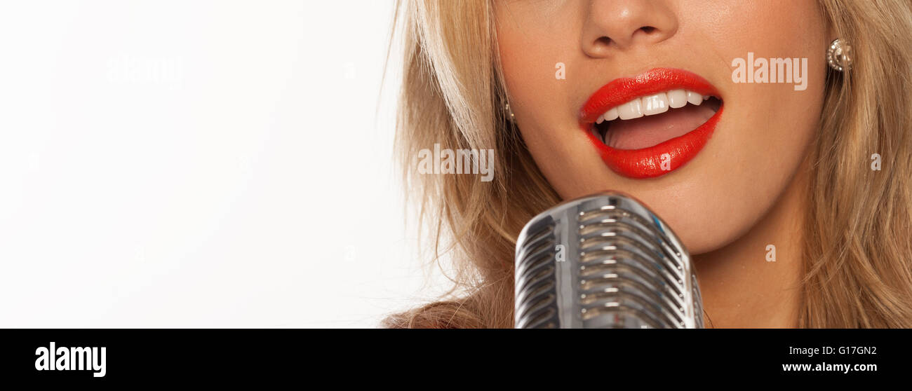 Sexy singer lips with retro microphone on white Stock Photo - Alamy