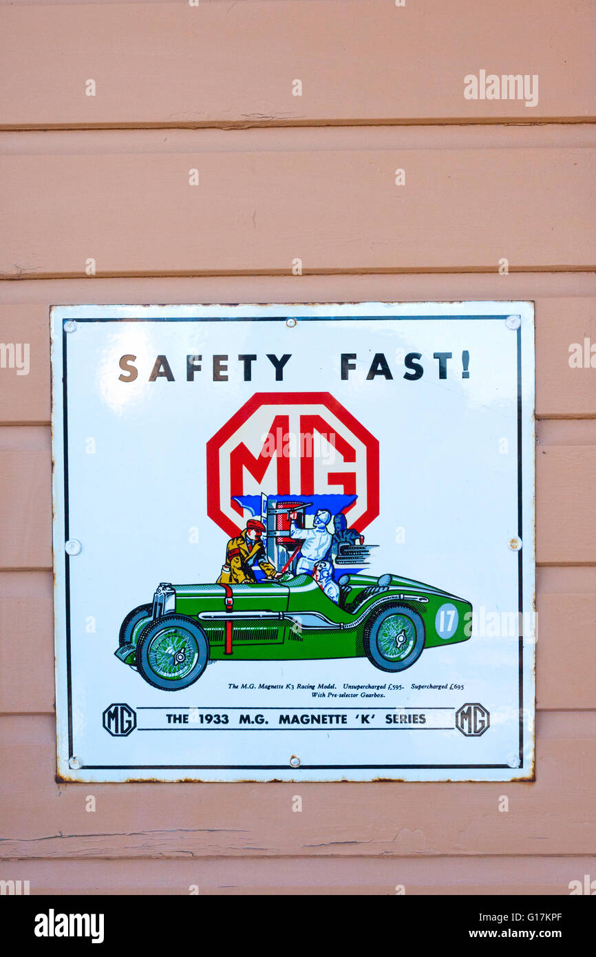 A vintage enamel sign for MG cars at Lydeard station on the West Somerset Railway