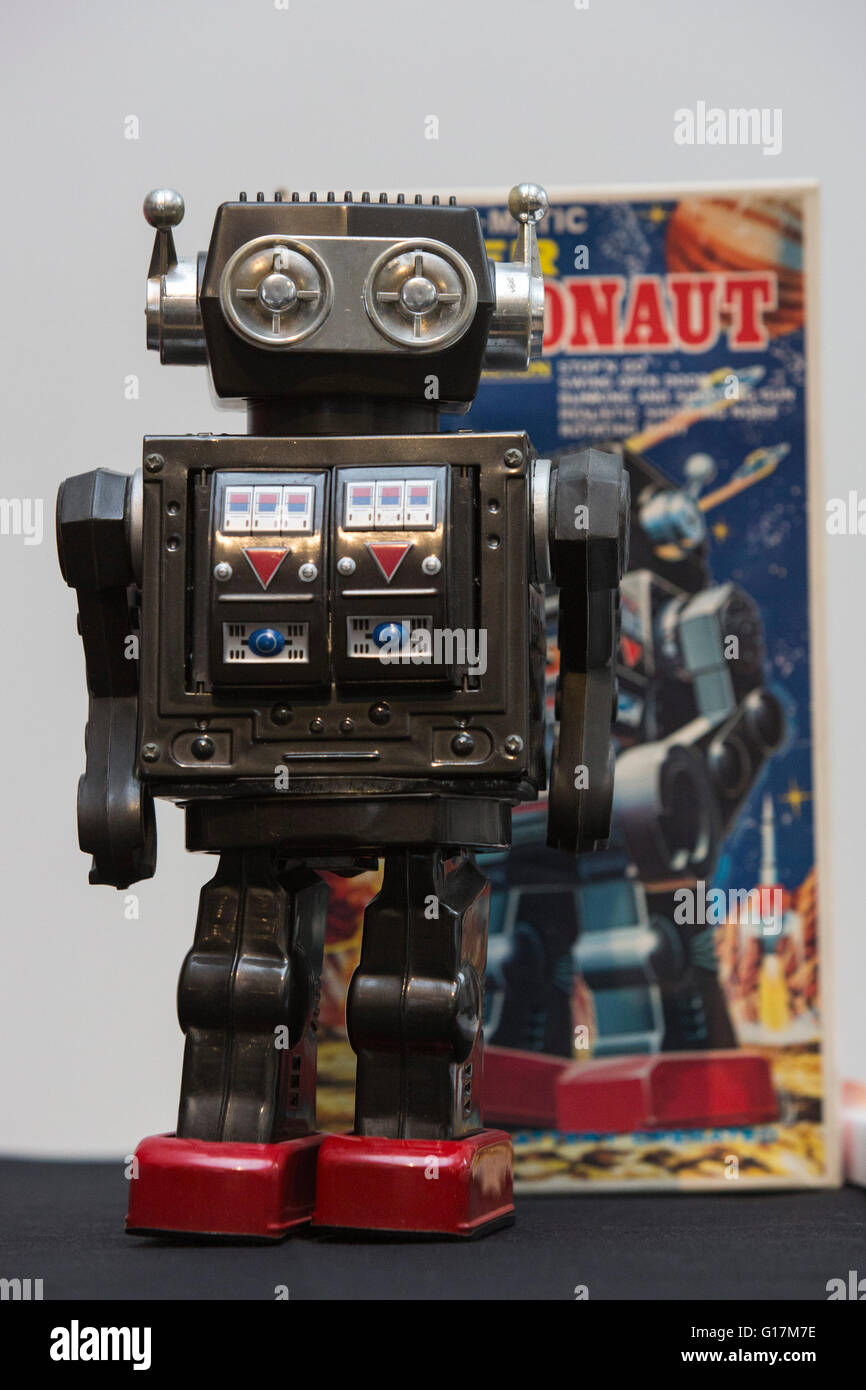 London, UK. 10 May 2016. Pictured: toy Super Astronaut robot with box, 1970's, Japan. The London Science Museum announces Rise of the Robots, the remarkable 500-year history of robots, in a new exhibition starting February 2017. Over 100 robots will feature in the exhibition which makes it the most significant collection of humanoid robots ever displayed in the world. Stock Photo