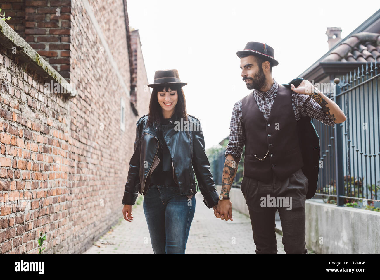Couple walking wall hires stock photography and images Alamy