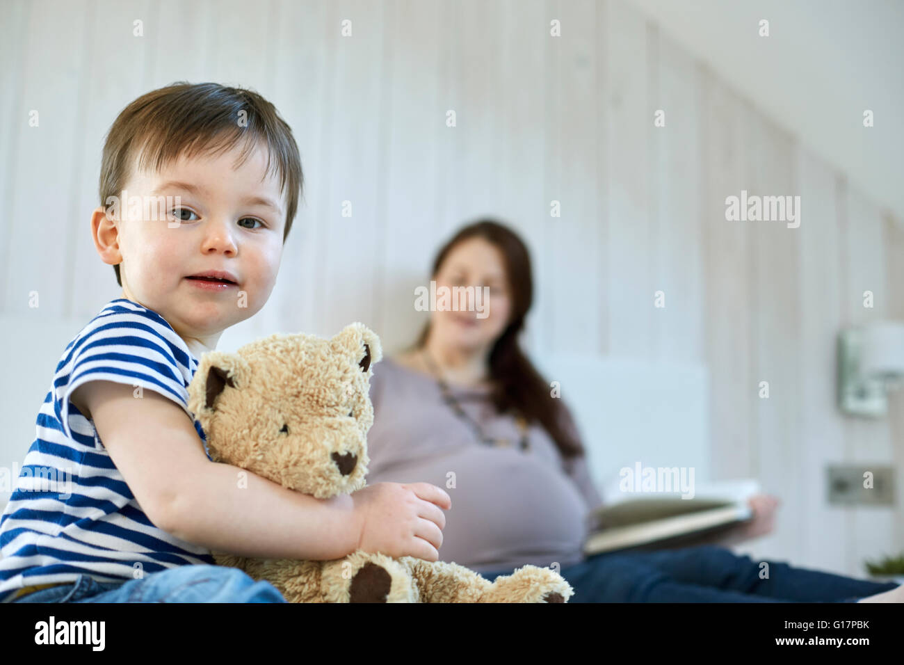 Boy with teddy bear hi-res stock photography and images - Alamy