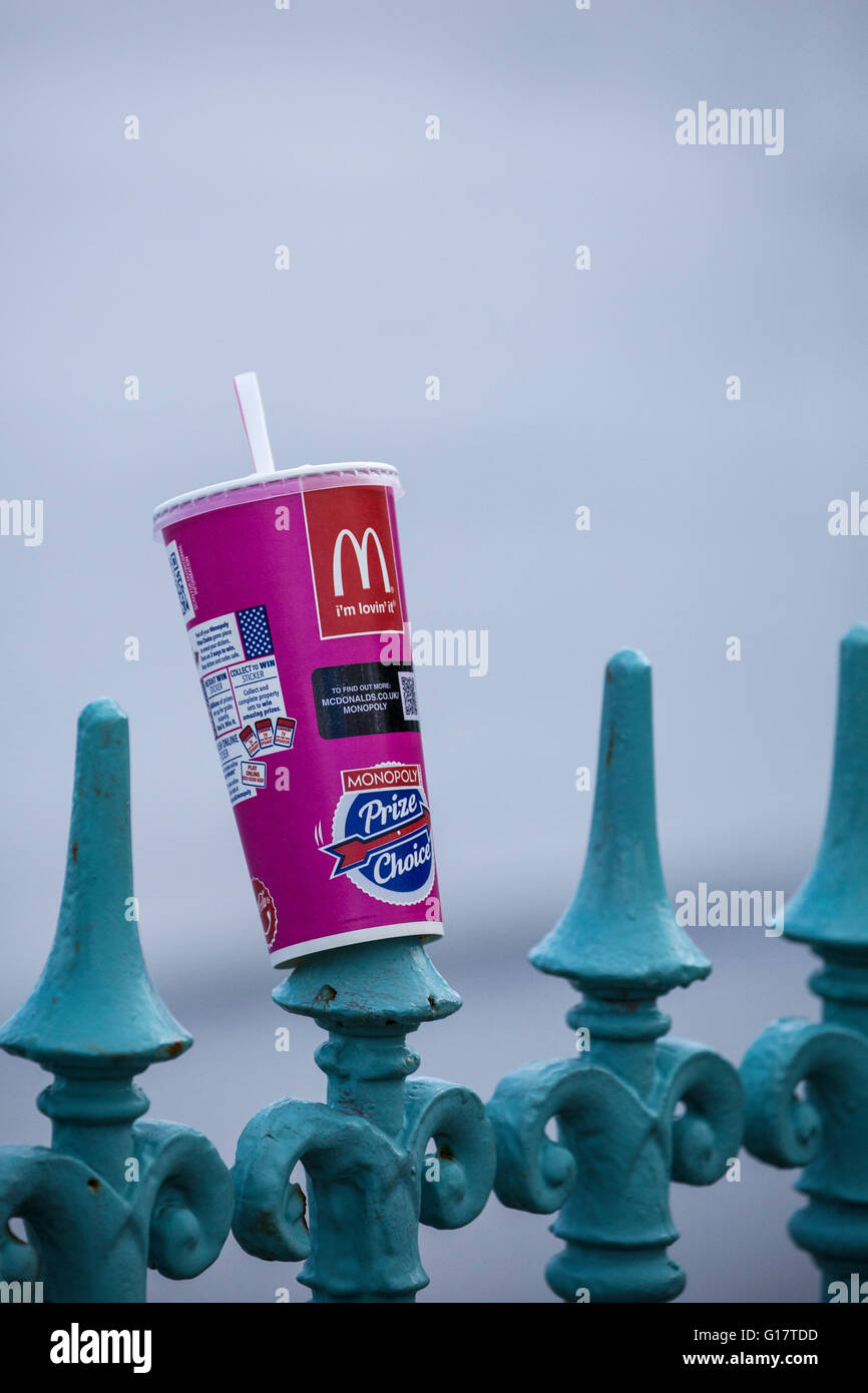 Litter, McDonalds Paper Cup Impaled on Spikey Railings Stock Photo Alamy