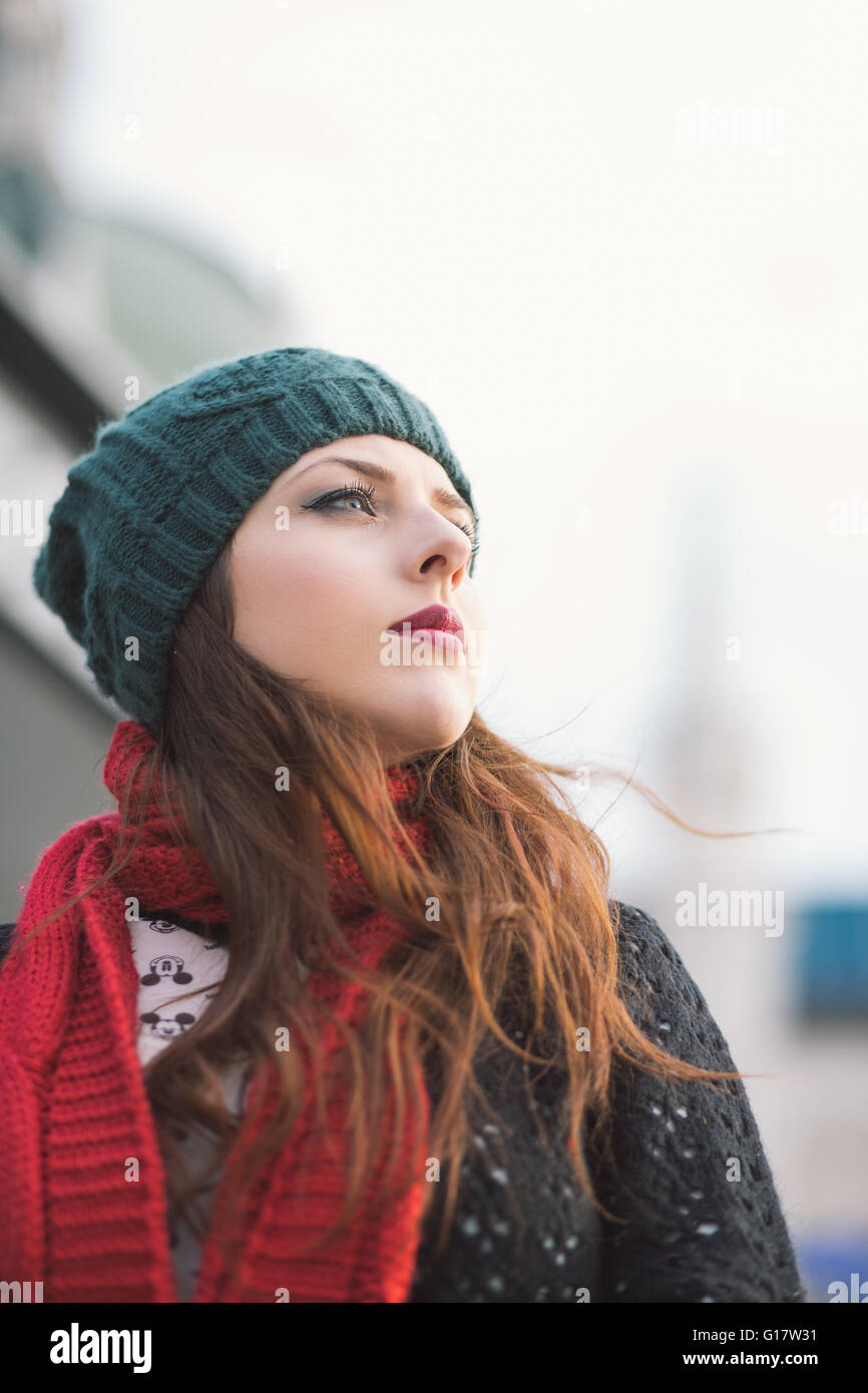 Portrait of young woman with red scarf Stock Photo