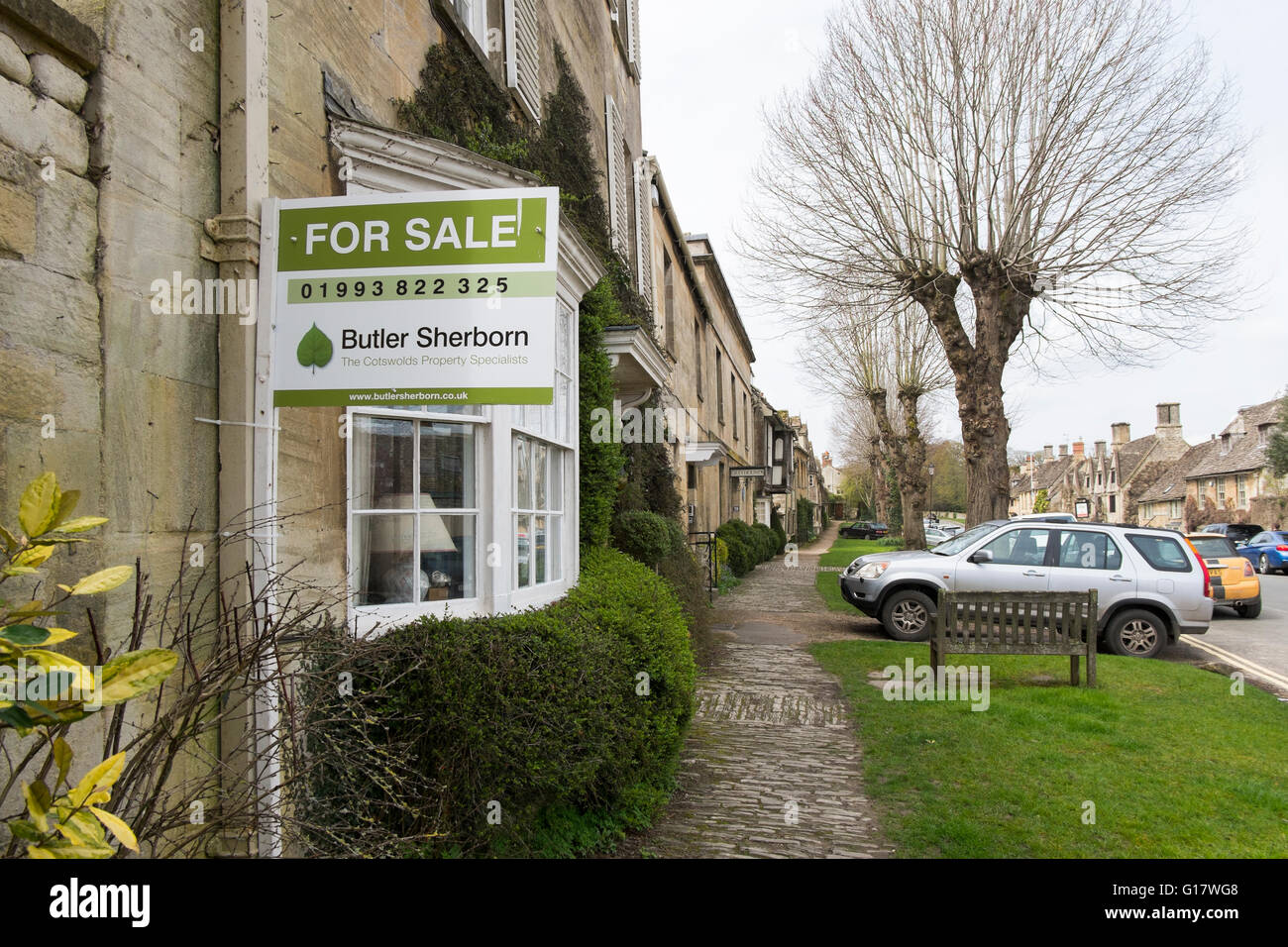 Estate Agents Butler Sherborn For Sale sign on a house in Sheep Street