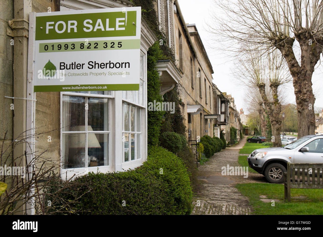 Estate Agents Butler Sherborn For Sale sign on a house in Sheep Street