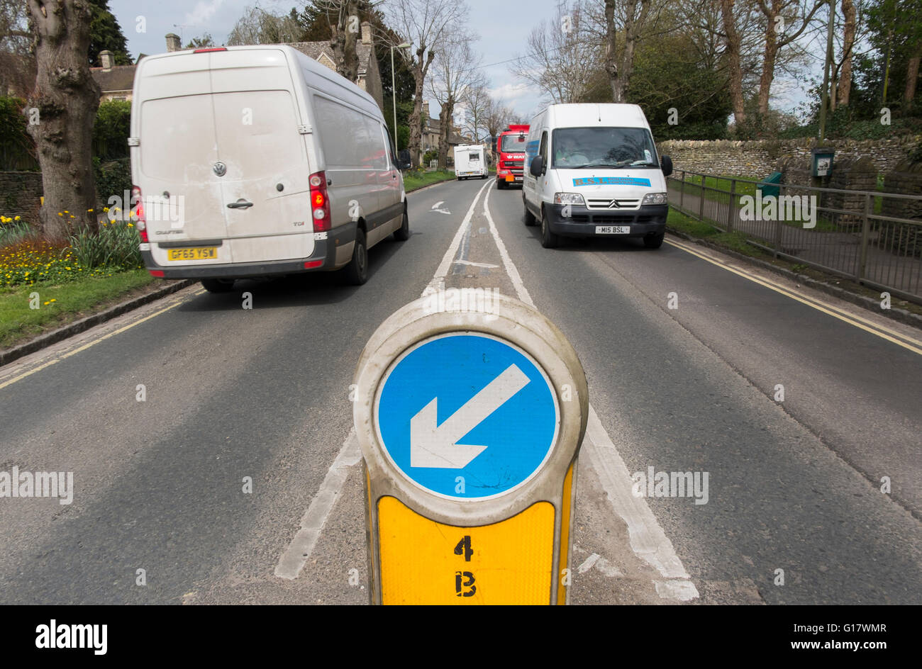 Keep Left sign  on The Hill on the A361 through Burford, Oxfordshire, UK Stock Photo