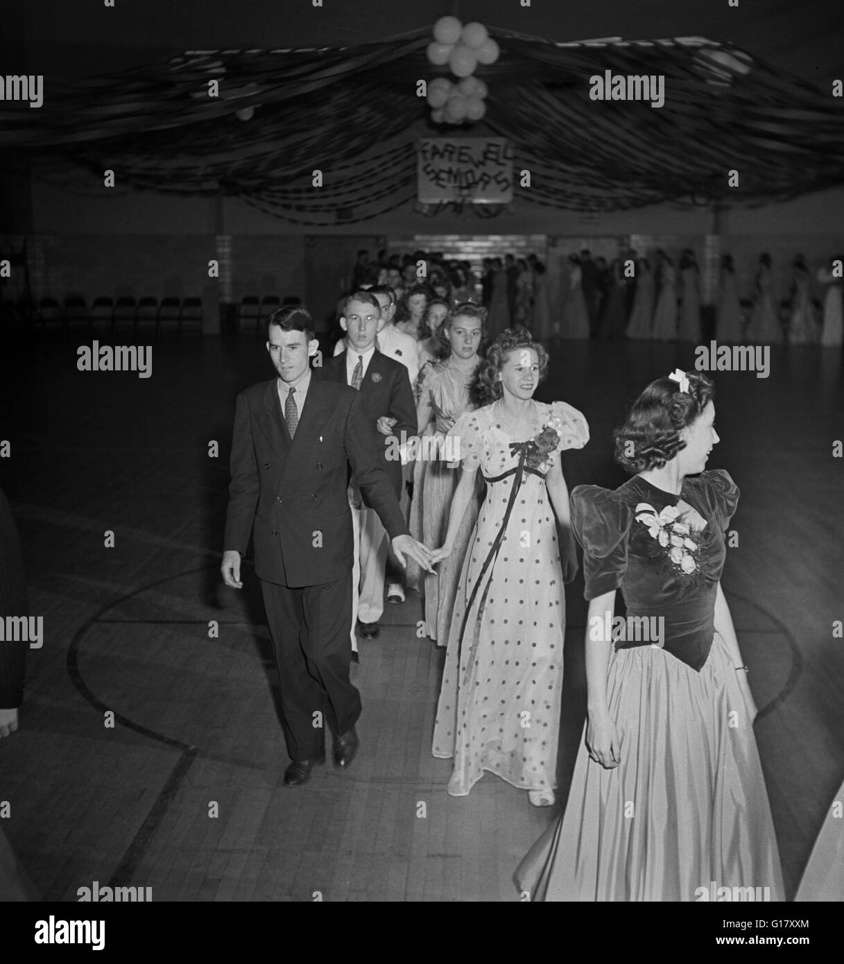 Grand March at Senior Prom Held in Gymnasium of Elementary School in Federal Housing Project, Greenbelt, Maryland, USA, Marjorie Collins for Farm Security Administration, June 1942 Stock Photo