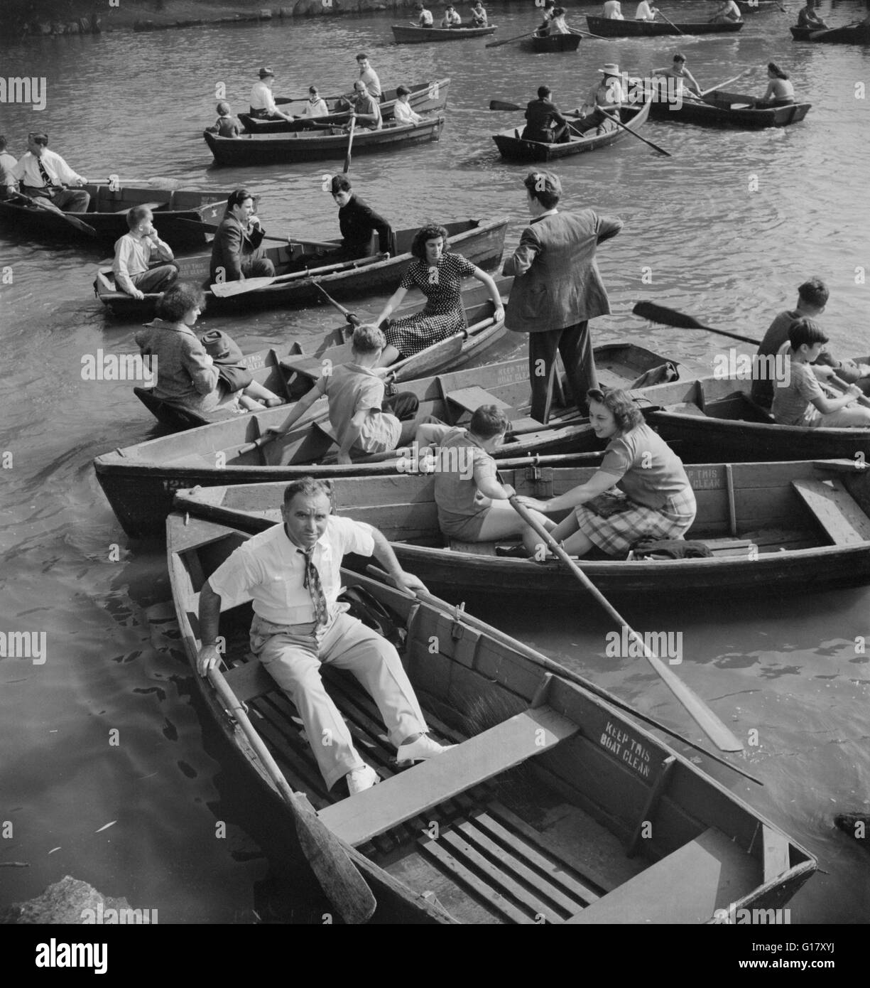 People in Row Boats on Lake on Sunday, Central Park, New York City, New York, USA, Marjorie Collins for Office of War Information, September 1942 Stock Photo