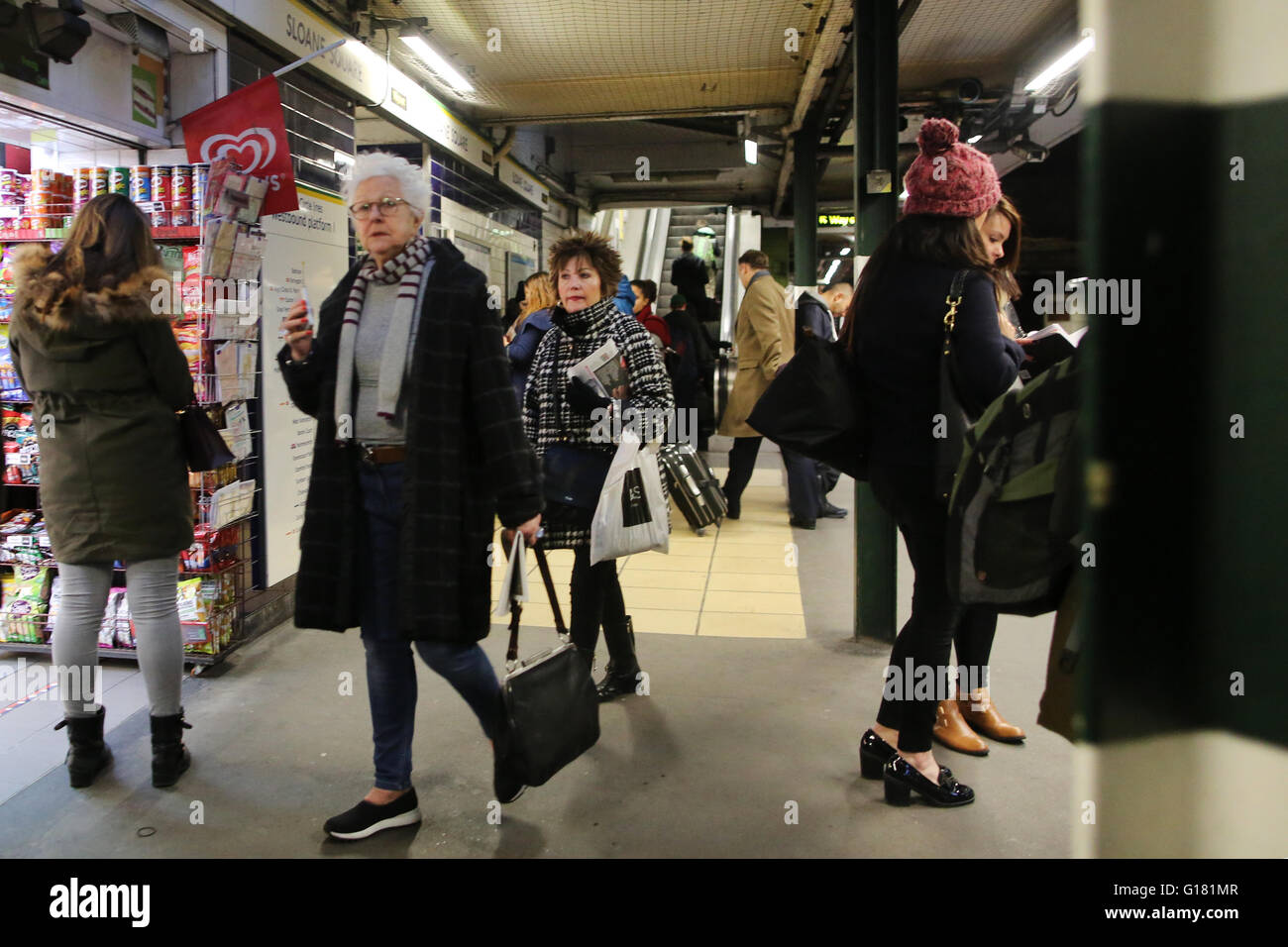 People on The London Underground , Sloane Square station, Chelsea, London Stock Photo