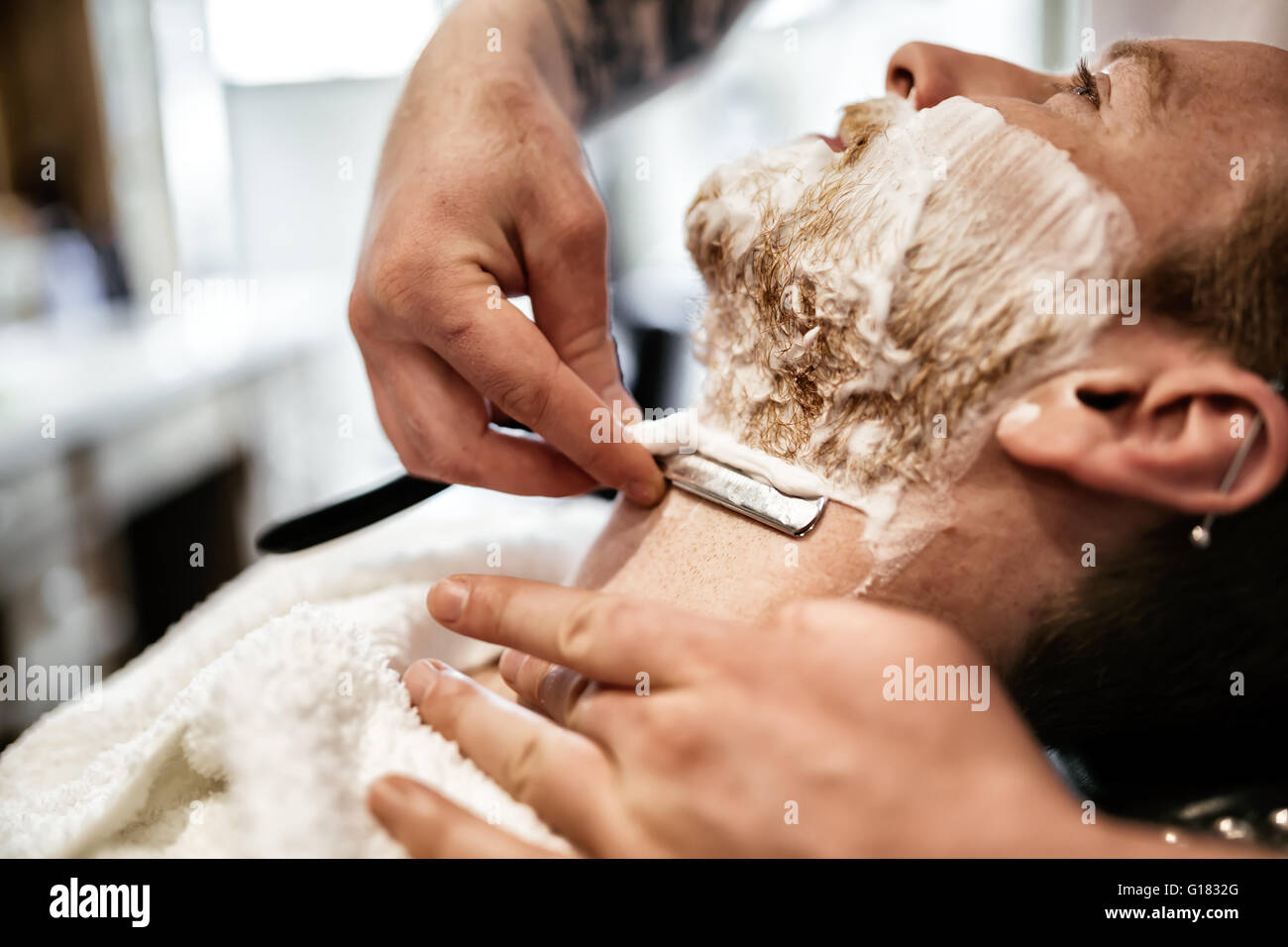 Retro shaving with foam in barber shop Stock Photo - Alamy