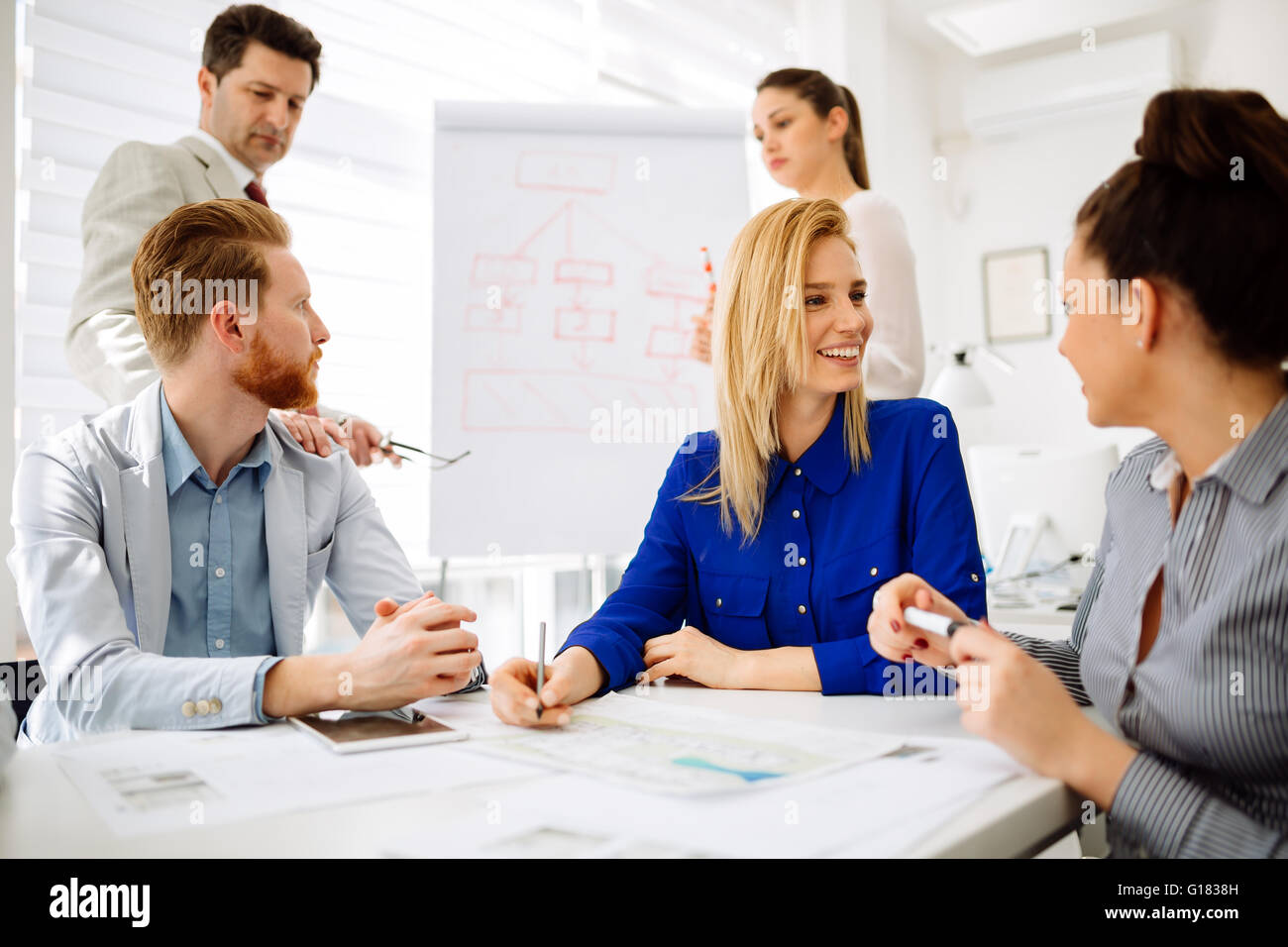 Business people working in office and collaborating Stock Photo