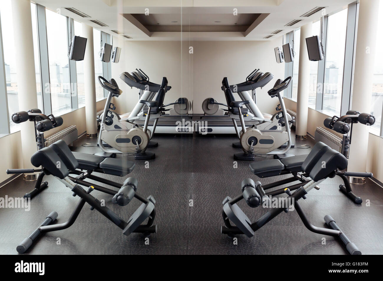 Equipped gym with panoramic view of city Stock Photo