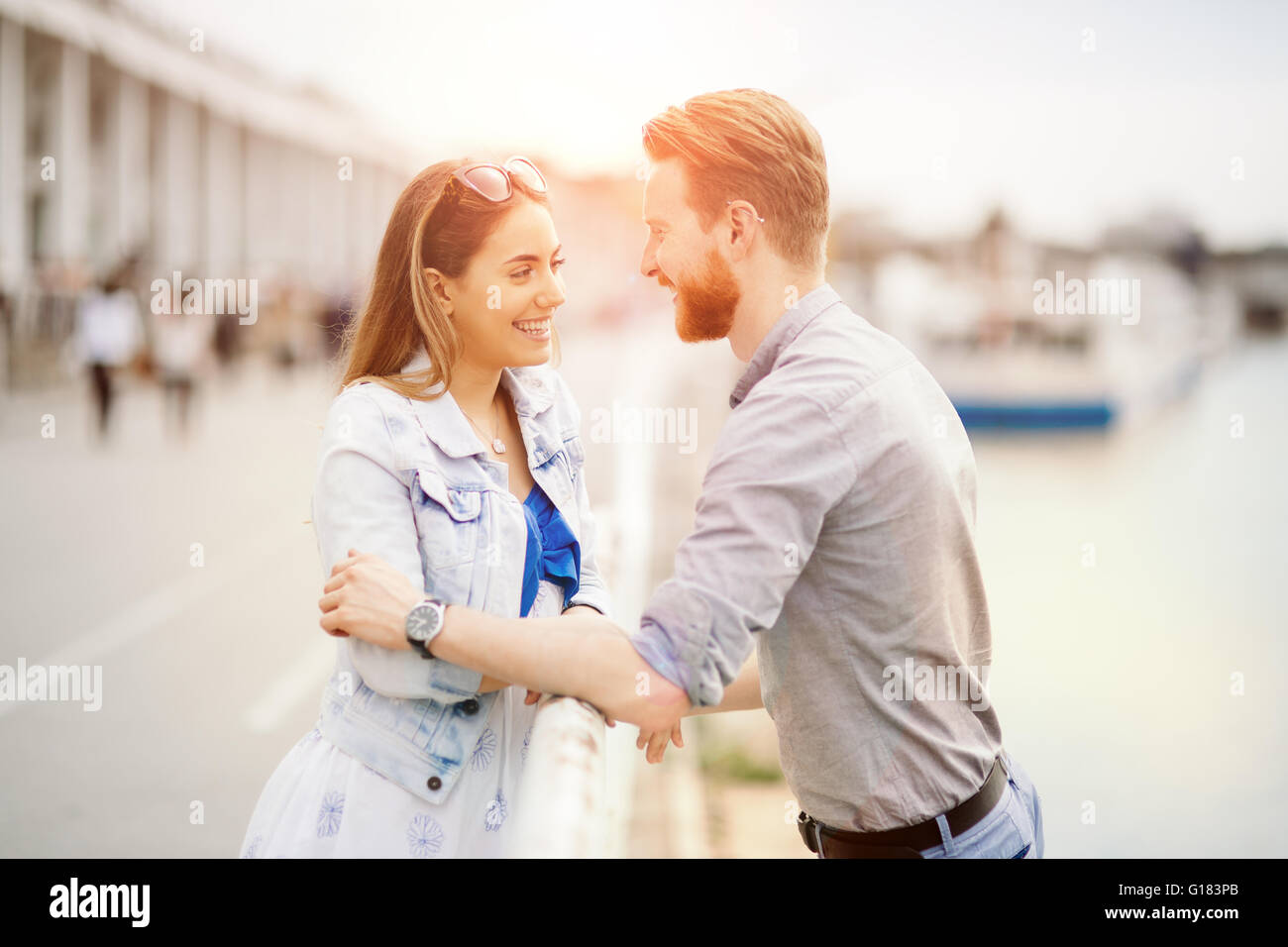 Couple in love sharing emotions in beautiful sunset Stock Photo