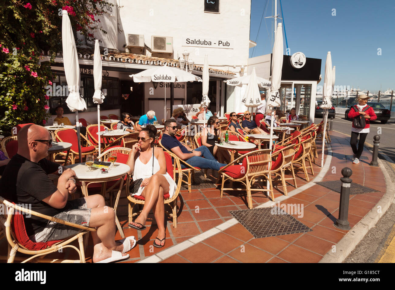 Spain bar; people drinking at a bar, Puerto Banus harbour, Marbella, Costa  del Sol, Andalusia Spain Stock Photo - Alamy