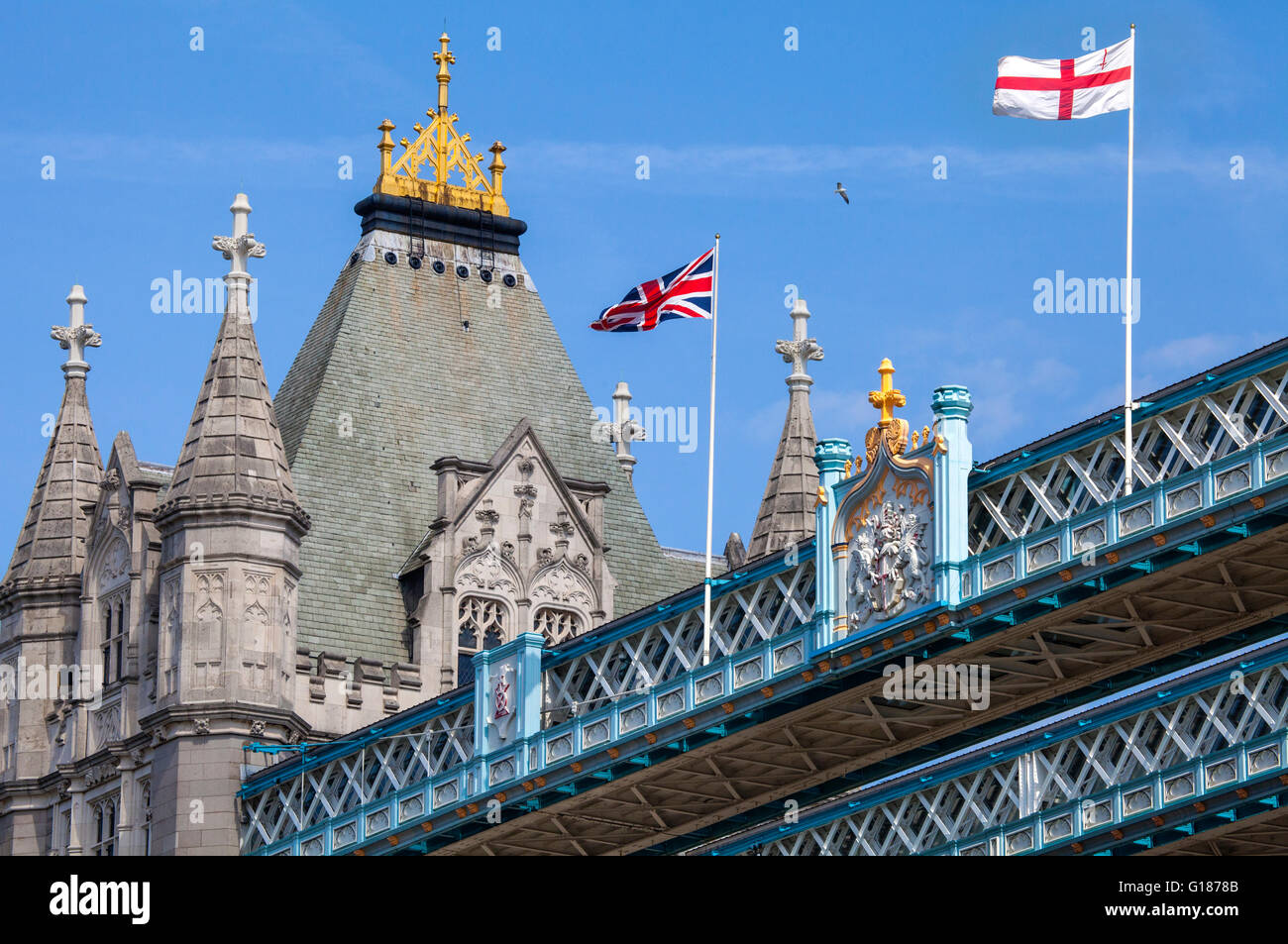 The Union Flag and St Georges Flag proudly flying on the top of Tower Bridge in London. Stock Photo