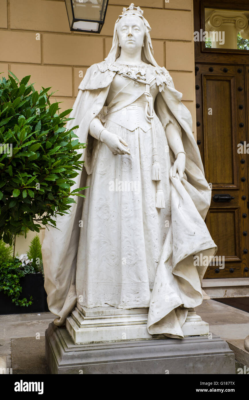 A statue of Queen Victoria situated on Carlton House Terrace in central