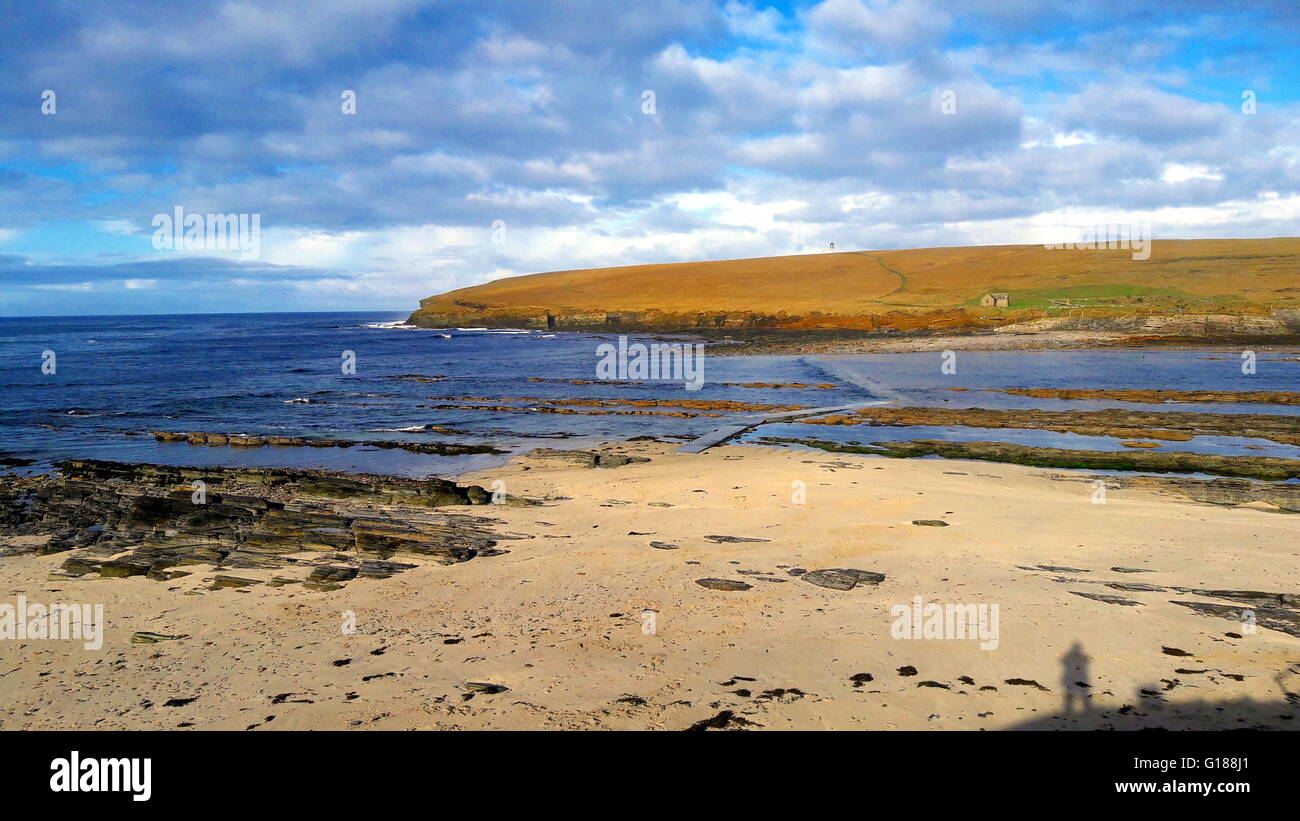 A view of the Brough of Birsay in Orkney, UK with photographer's shadow in bottom corner Stock Photo