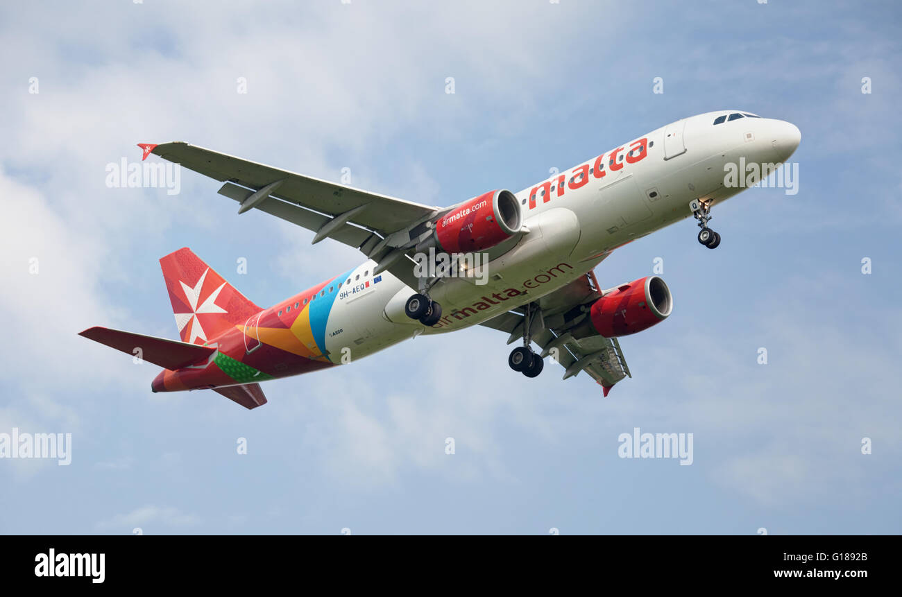 Air malta airbus a320 landing at heathrow airport hires stock
