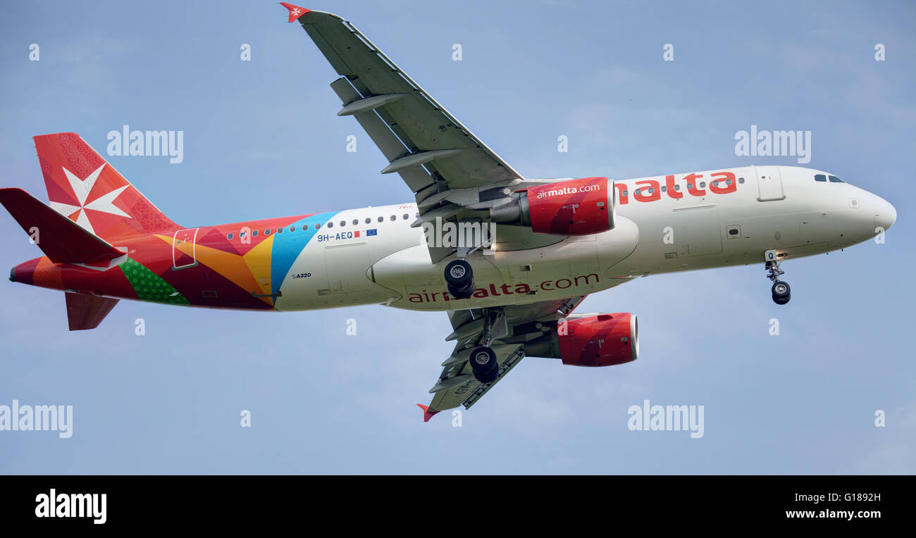 Air malta airbus a320 landing at heathrow airport hires stock