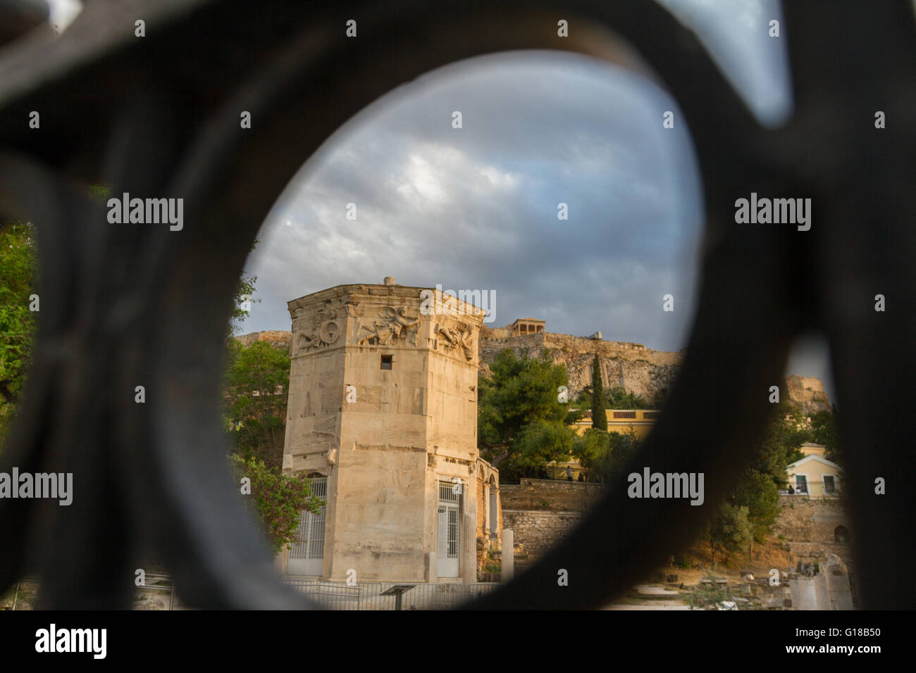 View through gate of Tower of the Wind-gods in Roman Forum and Acropolis shot in an afternoon of April 2016 Stock Photo