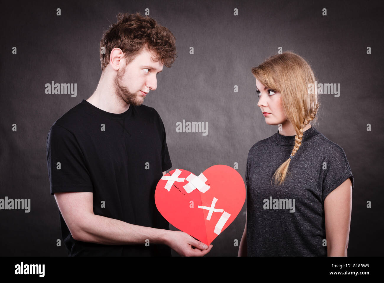Broken heart difficult love concept. Sad unhappy couple woman and man ...