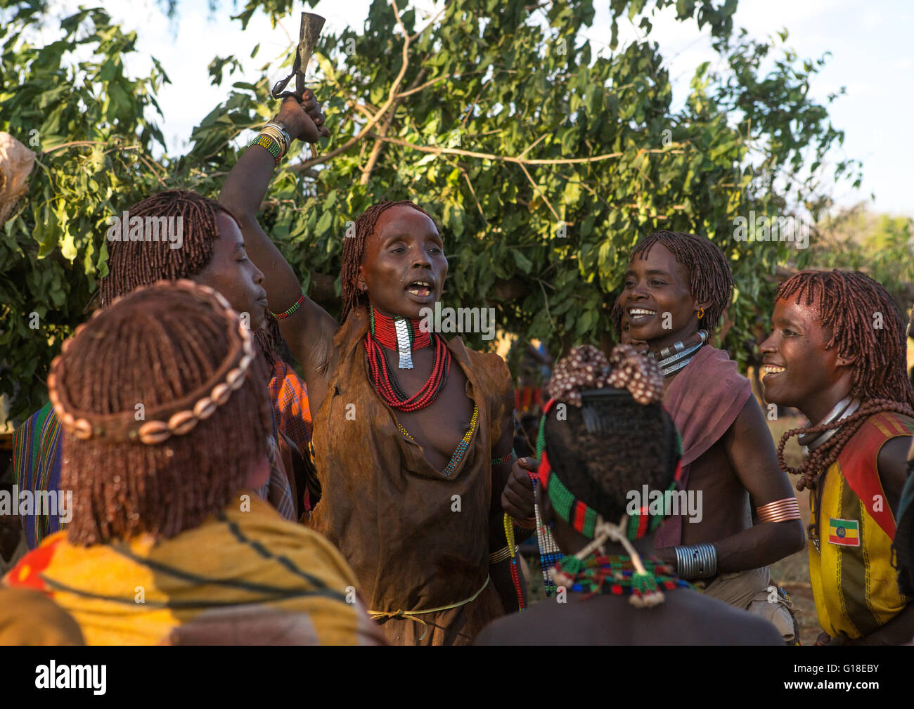 Hamer tribe women dancing during a bull jumping ceremony, Omo valley, Turmi, Ethiopia Stock Photo