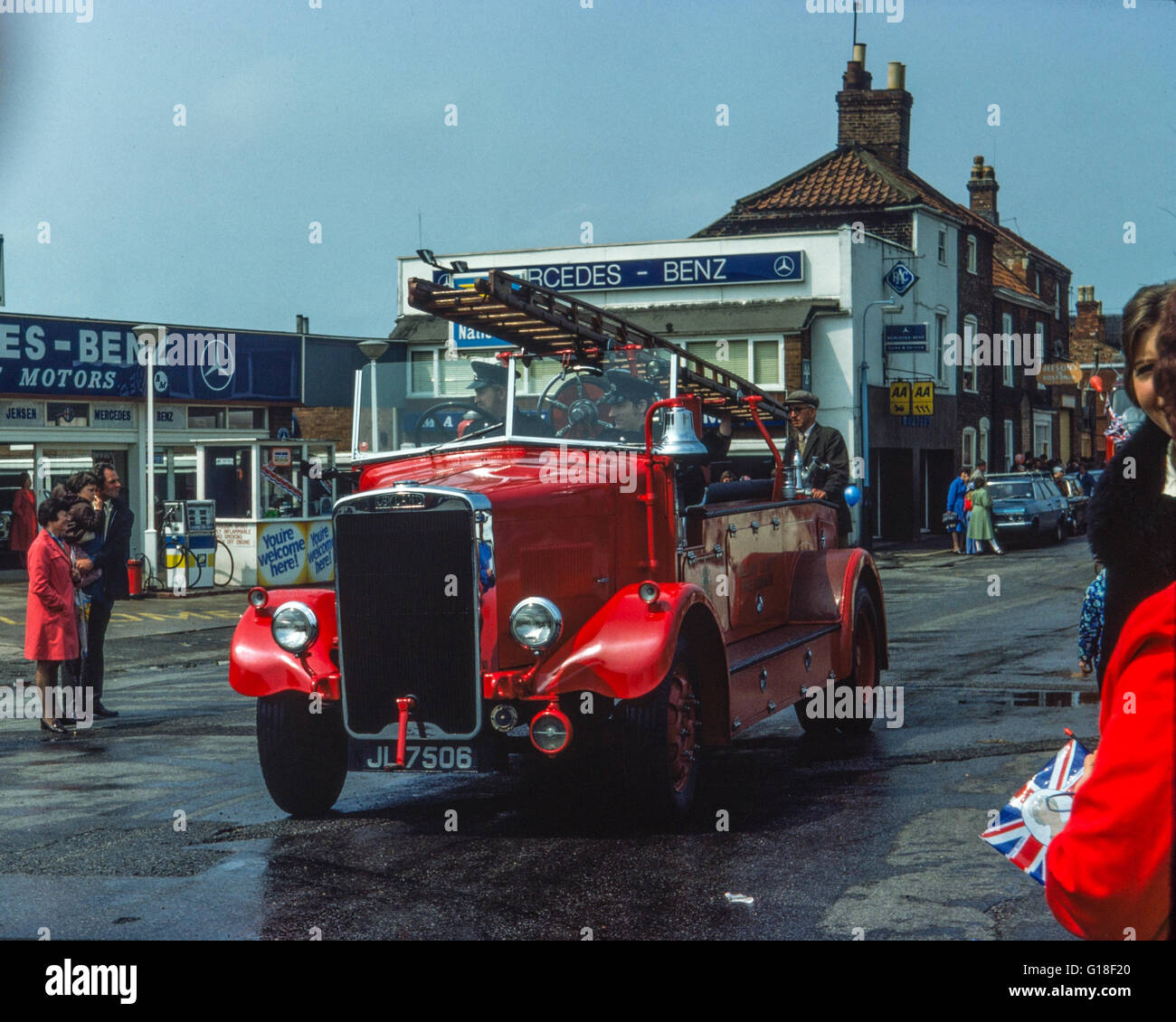 Archive image of a 1940 Leyland Cub FK8 pump escape fire engine,  at carnival parade for Queen Elizabeth ll silver jubilee, Horncastle Road, Boston, Lincolnshire, England, June 1977. See also FXMNDP FXMNDR FXMNDH FXMNDW Stock Photo