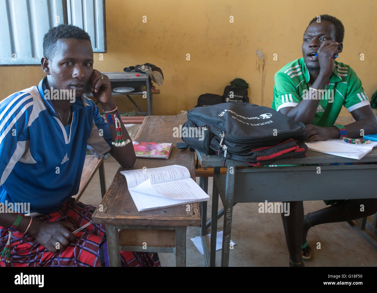 Hamer tribe teenage boys in classroom, Omo valley, Turmi, Ethiopia Stock Photo