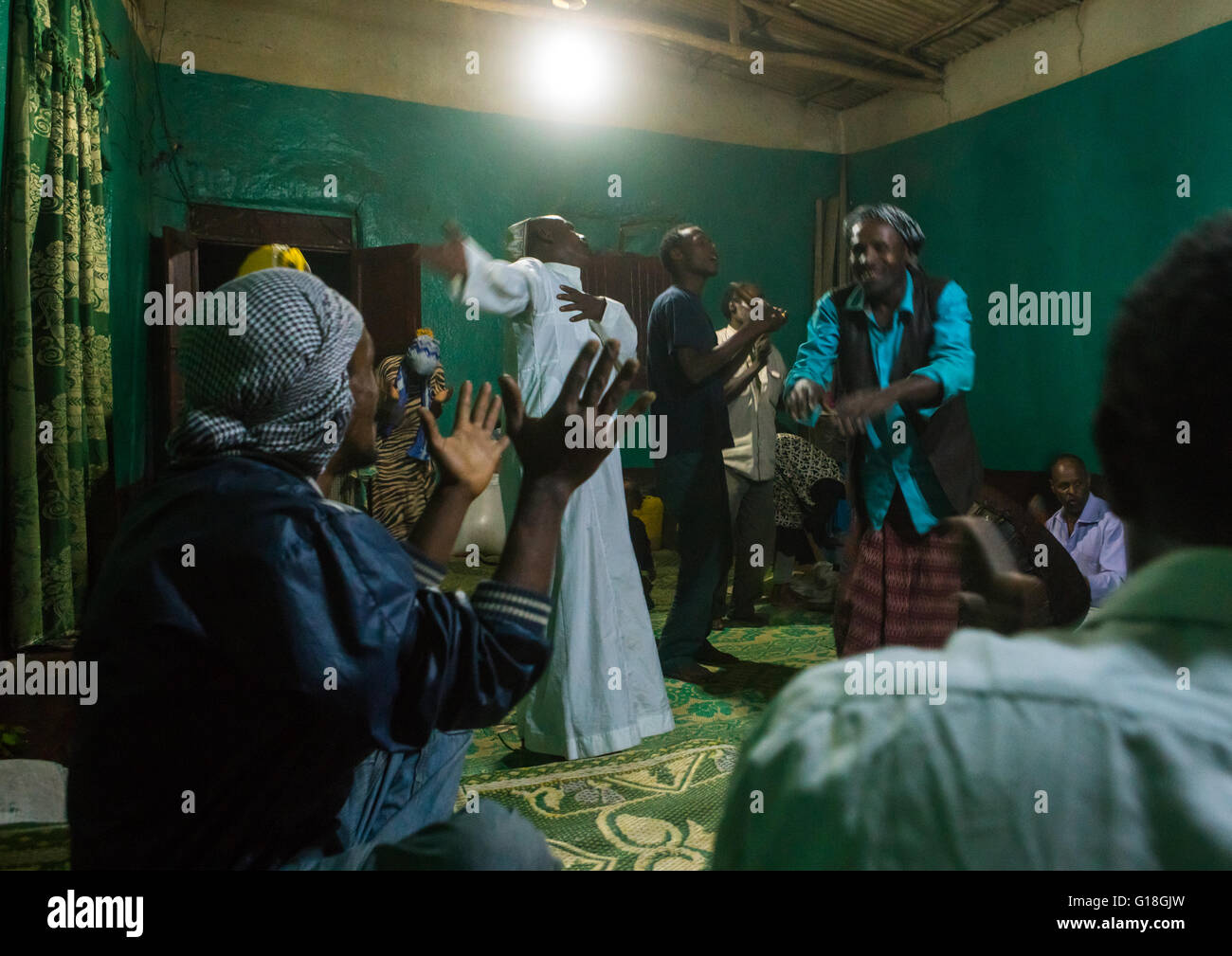 Sufi people go into a trance during a ceremony, Harari region, Harar, Ethiopia Stock Photo