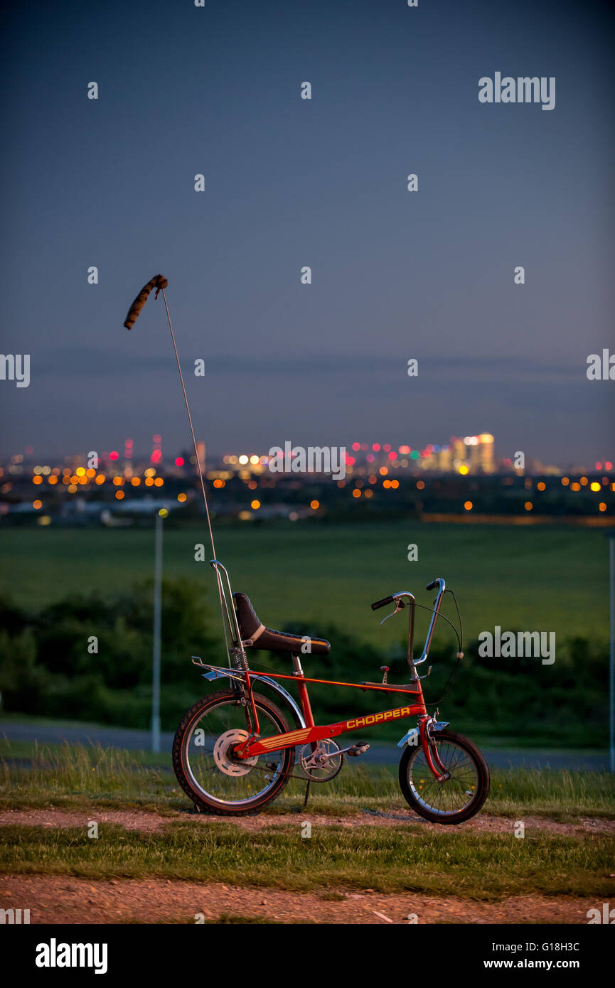 Original 1970s Raleigh Chopper Mark II with the London City skyline Stock Photo