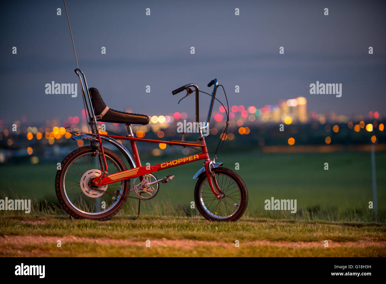 Original 1970s Raleigh Chopper Mark II with the London City skyline Stock Photo