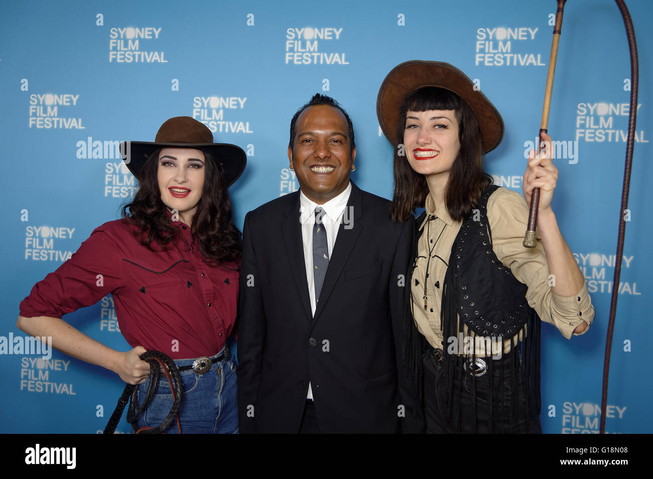 Sydney, Australia. 11th May, 2016. Festival Director Nashen Moodley, Bella Louche and Julia Rose pose for photographs at the 63rd Sydney Film Festival program official launch at Customs House. Sydney Film Festival is one of the world's longest-running film festivals, and is a major event on the New South Wales cultural calendar. Credit:  Hugh Peterswald/Pacific Press/Alamy Live News Stock Photo