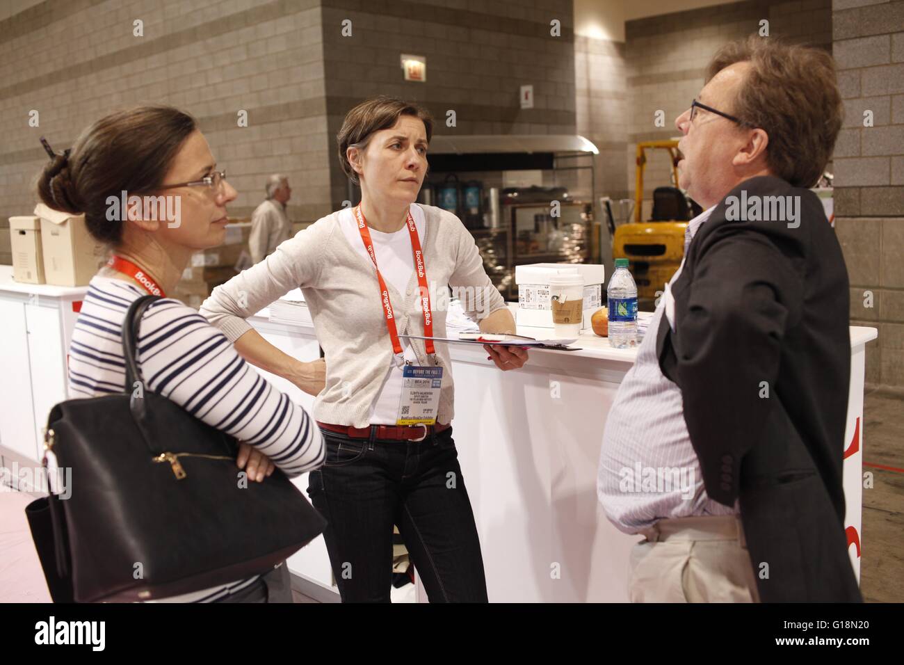 Chicago, Illinois. 9 April 2016. Senior Expert Agnieszka Rasińska-Bóbr and Vice-Director Ela Kalinowska of the Polsih Book Institute plan for the Global Market Forum with BookExpo America 2016 conference organizer Rüdiger Wischenbart Credit:  David A. Goldfarb/Alamy Live News Stock Photo