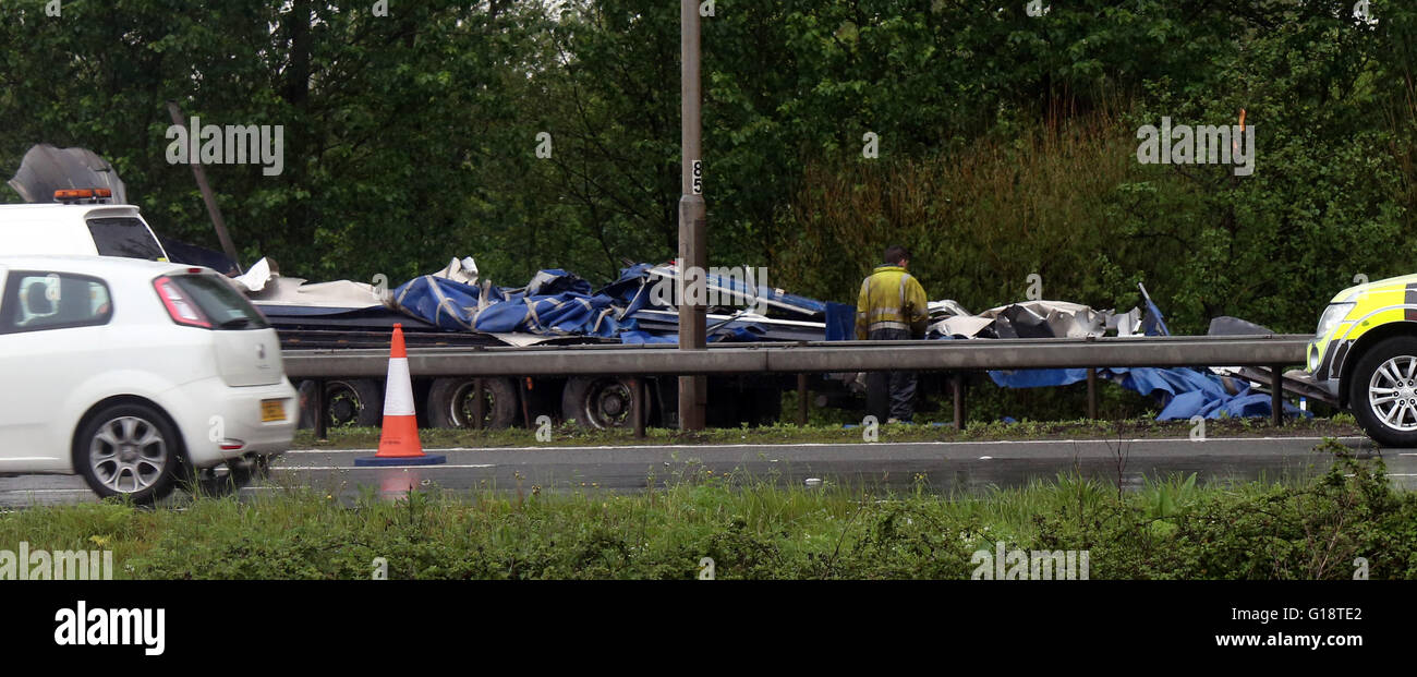 Reading, Berkshire, UK. 11th May 2016. Driver killed as lorry smashes through central reservation   A 49-year-old lorry driver has died after his vehicle overturned on the M4 near Reading on Wednesday morning.  Police have closed the motorway eastbound between junction 13 and 11 and two lanes have been shut on the westbound side of the carriageway.  The eastbound closures have caused seven miles of tailbacks.  The lorry, which crashed at just before 5am this morning, appears to have hit the central reservation and overturned. An investigation has been launched. Credit:  uknip/Alamy Live News Stock Photo