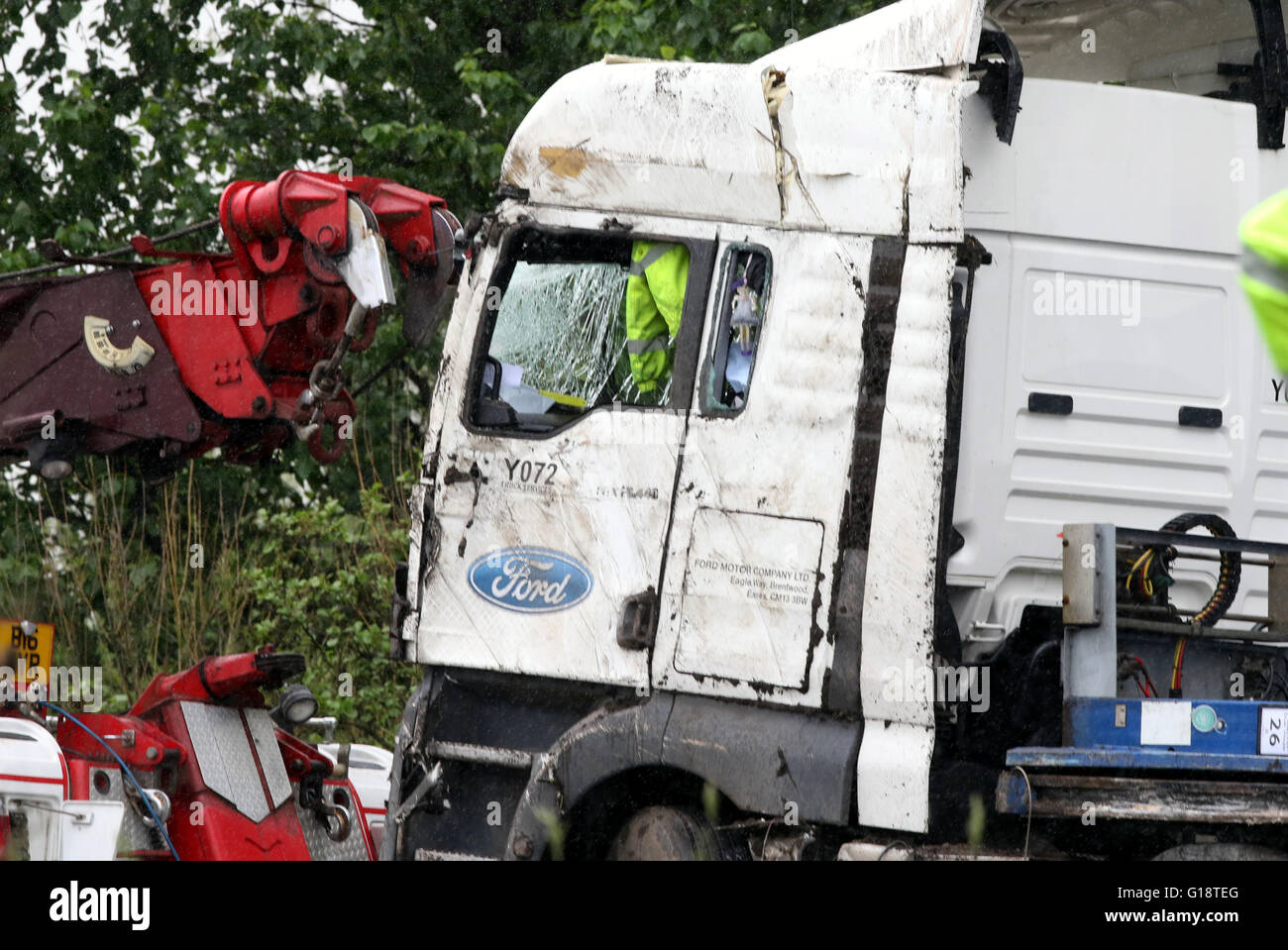 Reading, Berkshire, UK. 11th May 2016. Driver killed as lorry smashes through central reservation   A 49-year-old lorry driver has died after his vehicle overturned on the M4 near Reading on Wednesday morning.  Police have closed the motorway eastbound between junction 13 and 11 and two lanes have been shut on the westbound side of the carriageway.  The eastbound closures have caused seven miles of tailbacks.  The lorry, which crashed at just before 5am this morning, appears to have hit the central reservation and overturned. An investigation has been launched. Credit:  uknip/Alamy Live News Stock Photo