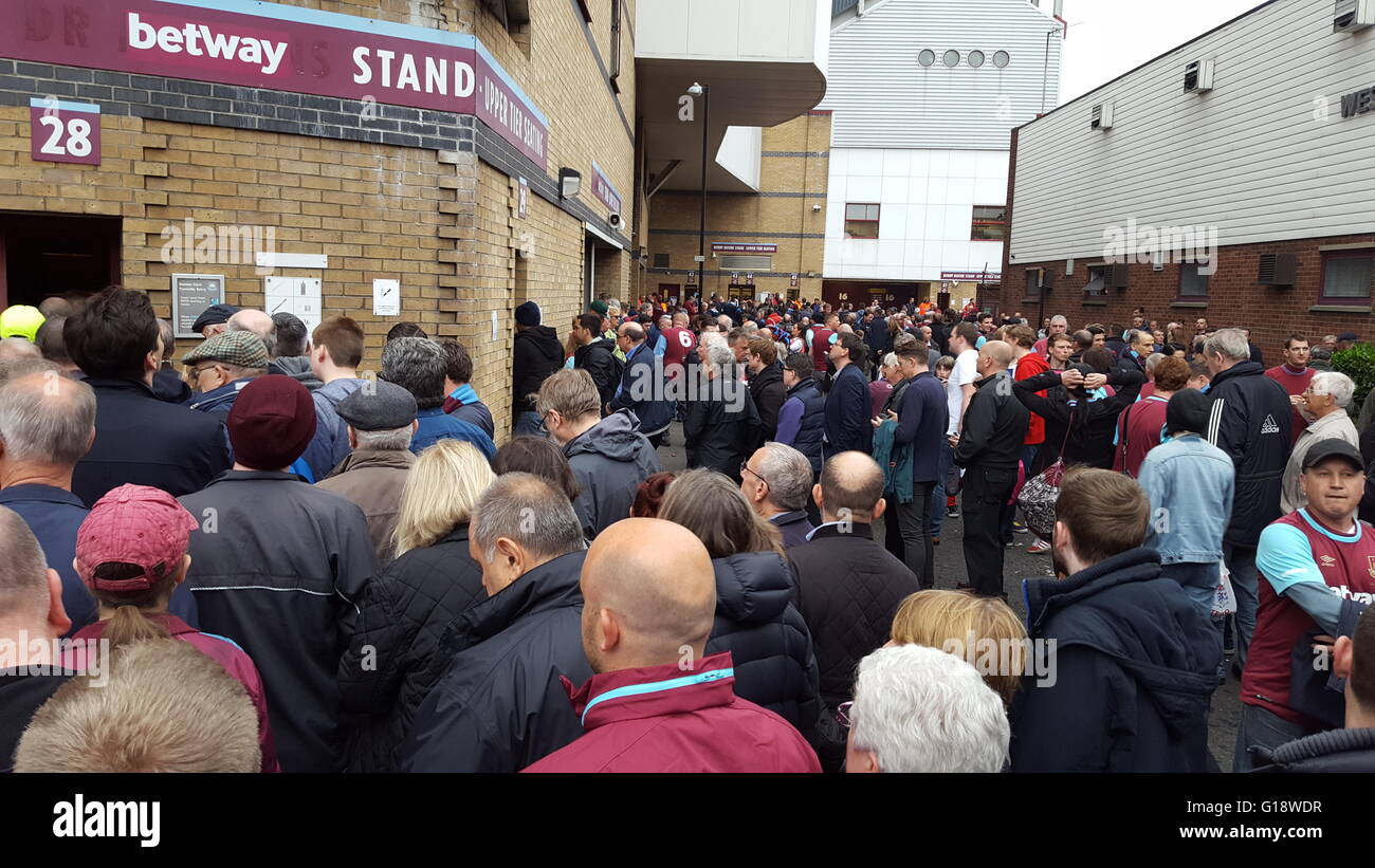 London, England. 10th May 2016.  West Ham United fans queuing at the turnstiles to enter the stadium to witness the last game at the Boleyn Ground.  Milton Cogheil/Alamy Live News Stock Photo