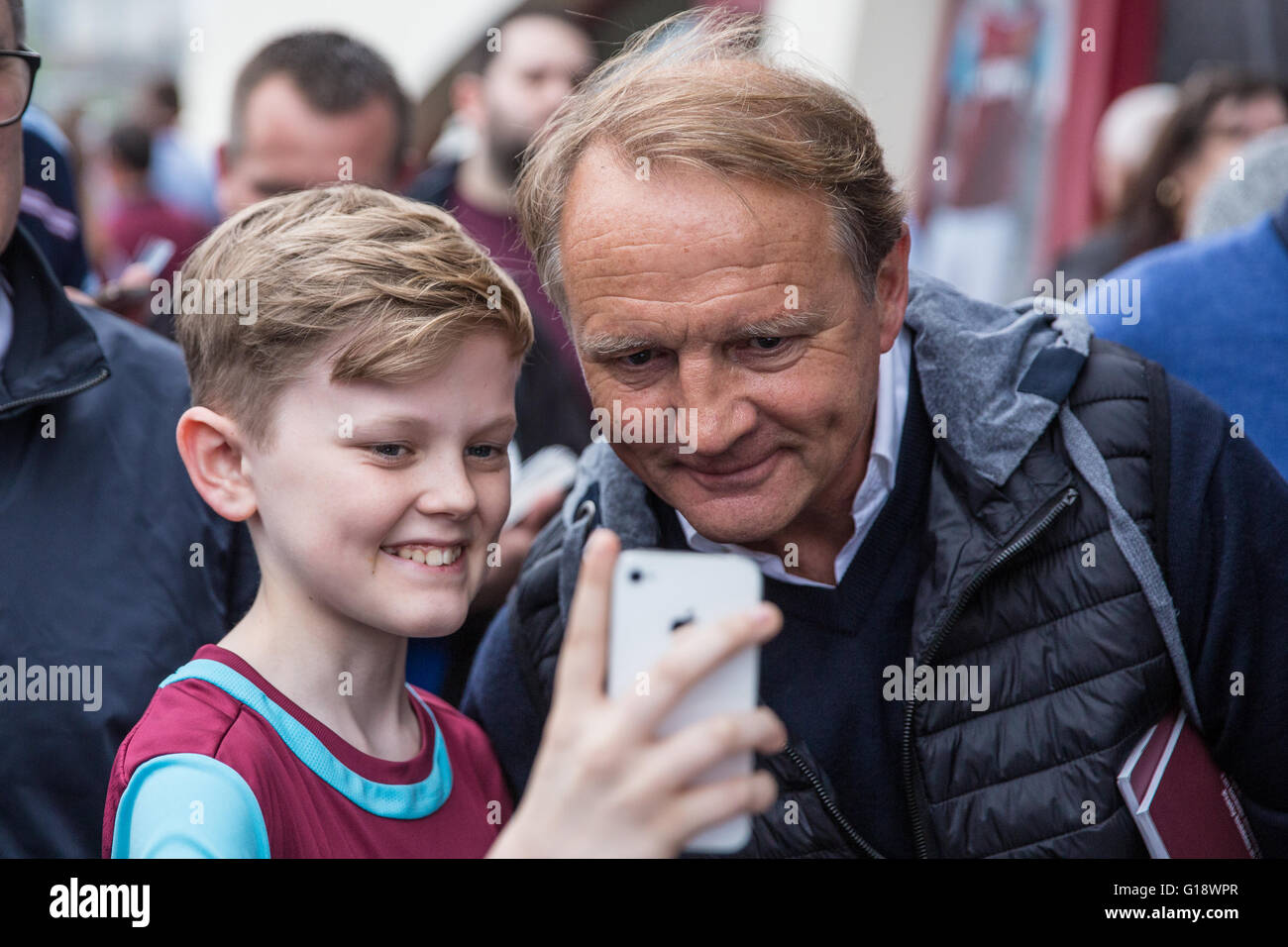 London, UK. 10th May, 2016. Paul Goddard, who made 170 appearances for West Ham between 1980 and 1986, scoring 54 goals, poses for a photograph outside the Boleyn Ground before the last ever match at the stadium. Stock Photo