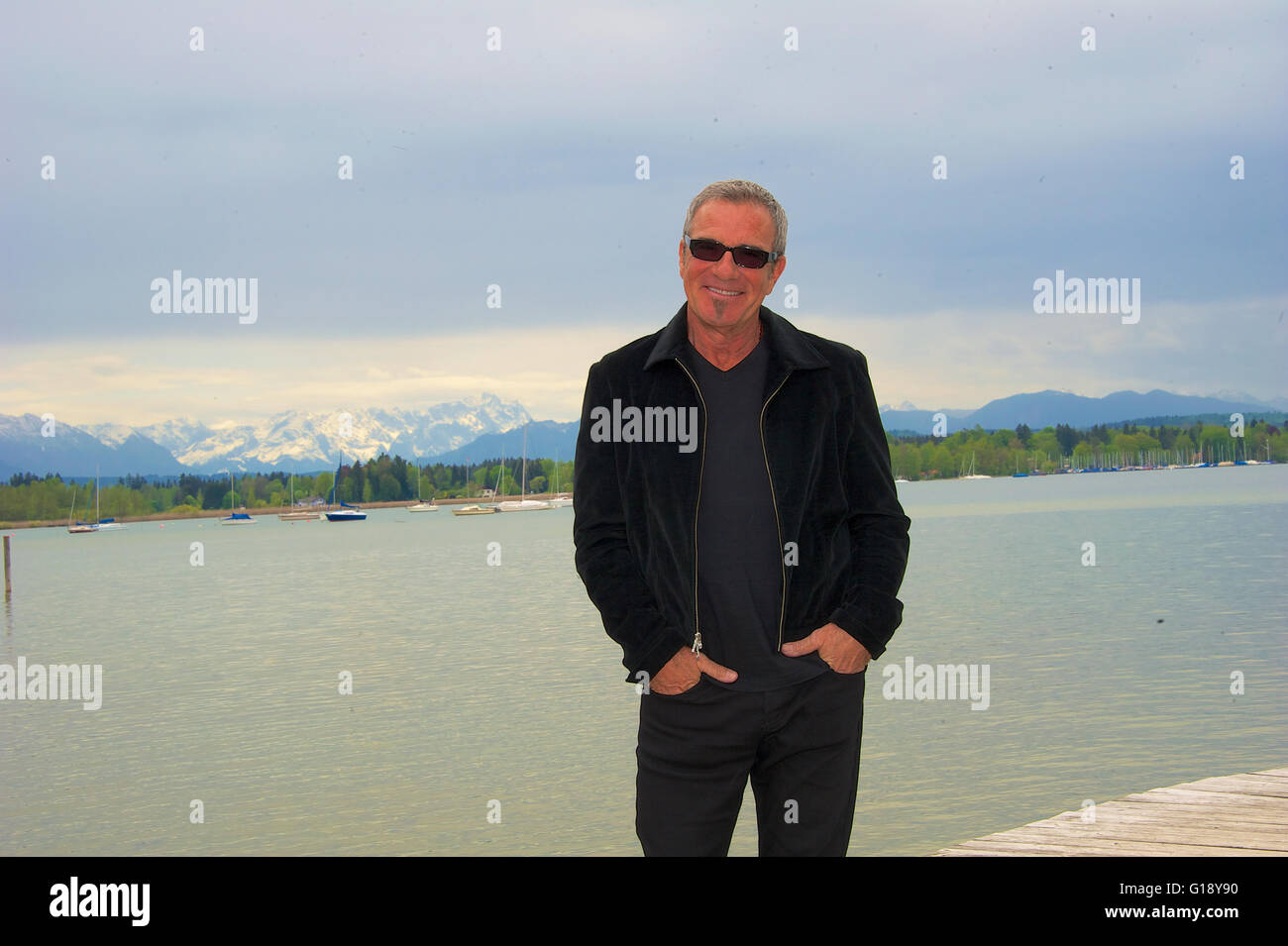 Seeshaupt, Germany. 10th May, 2016. dpa EXCLUSIVE - Tico Torres, drummer of Bon Jovi, stands on a jetty after a presentation of his 'Rock Star Baby' fashion collection at the Lupaco Concept Store in Seeshaupt, Germany, 10 May 2016. Photo: Ursula Dueren/dpa/Alamy Live News Stock Photo