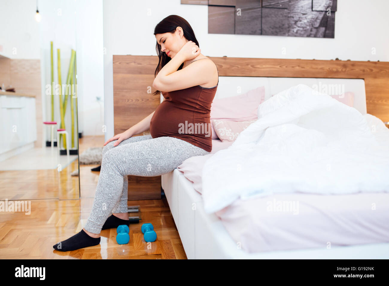 Beautiful pregnant woman having body aches Stock Photo Alamy