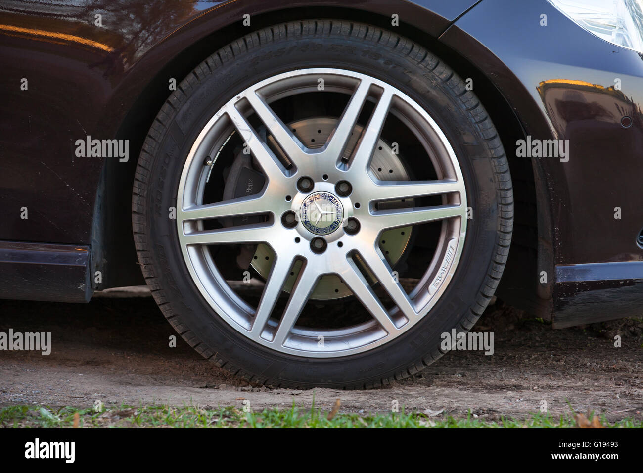 Imatra, Finland - May 8, 2016: Closeup photo of car wheel designed by AMG with Mercedes Benz logotype Stock Photo