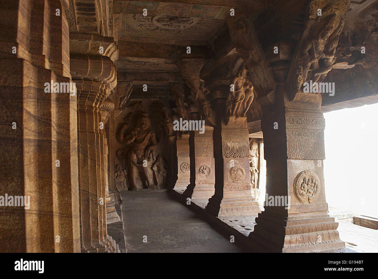 Cave 3 : Carved figure of Vishnu as Narasimha (half human, half lion). Brackets of the pillars, except for one, has carvings of Stock Photo