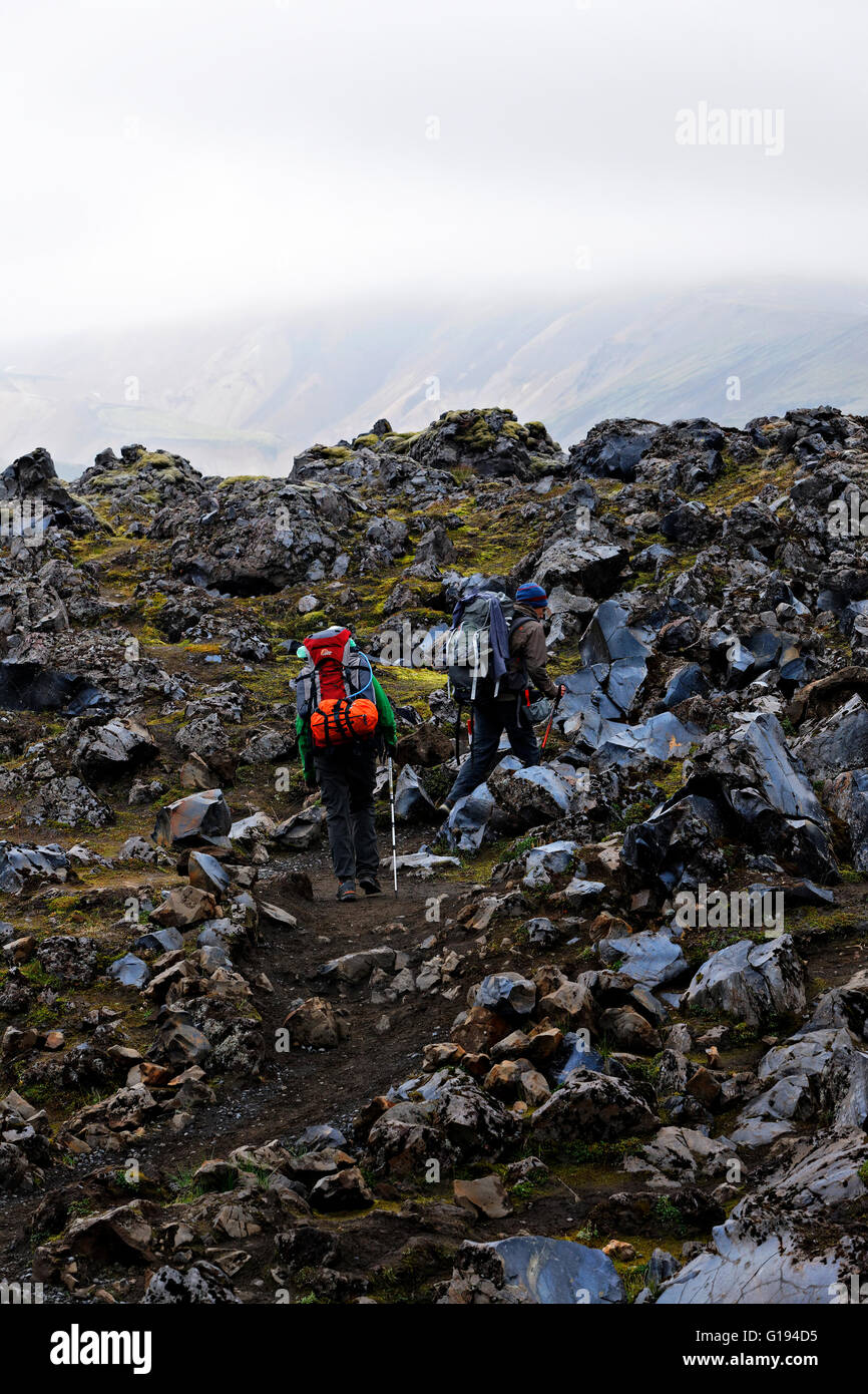 Hikers in Volcanic Landscape, Landmannalaugar  Iceland Stock Photo