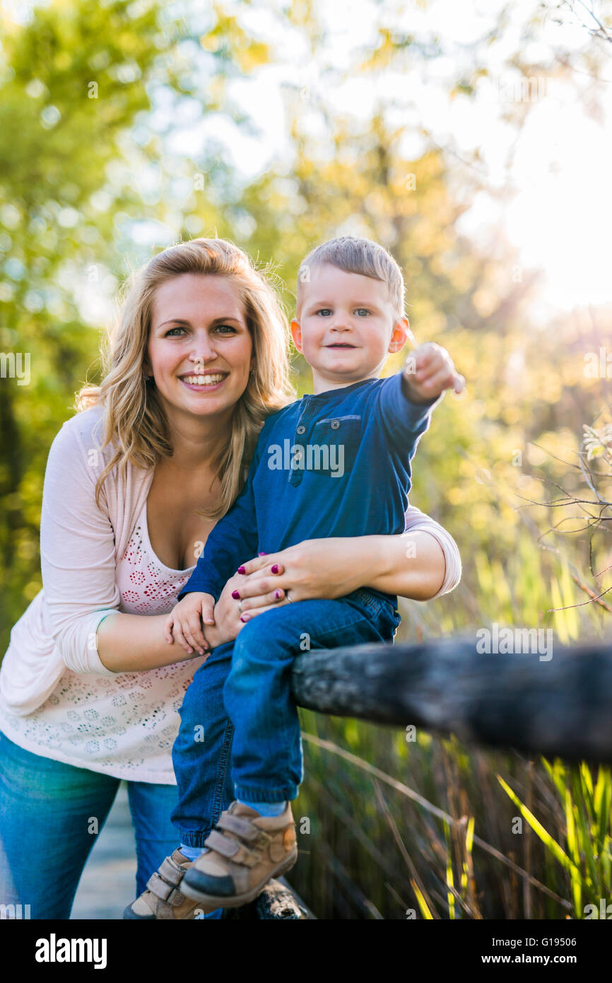 Beautiful young mother with her handsome son Stock Photo