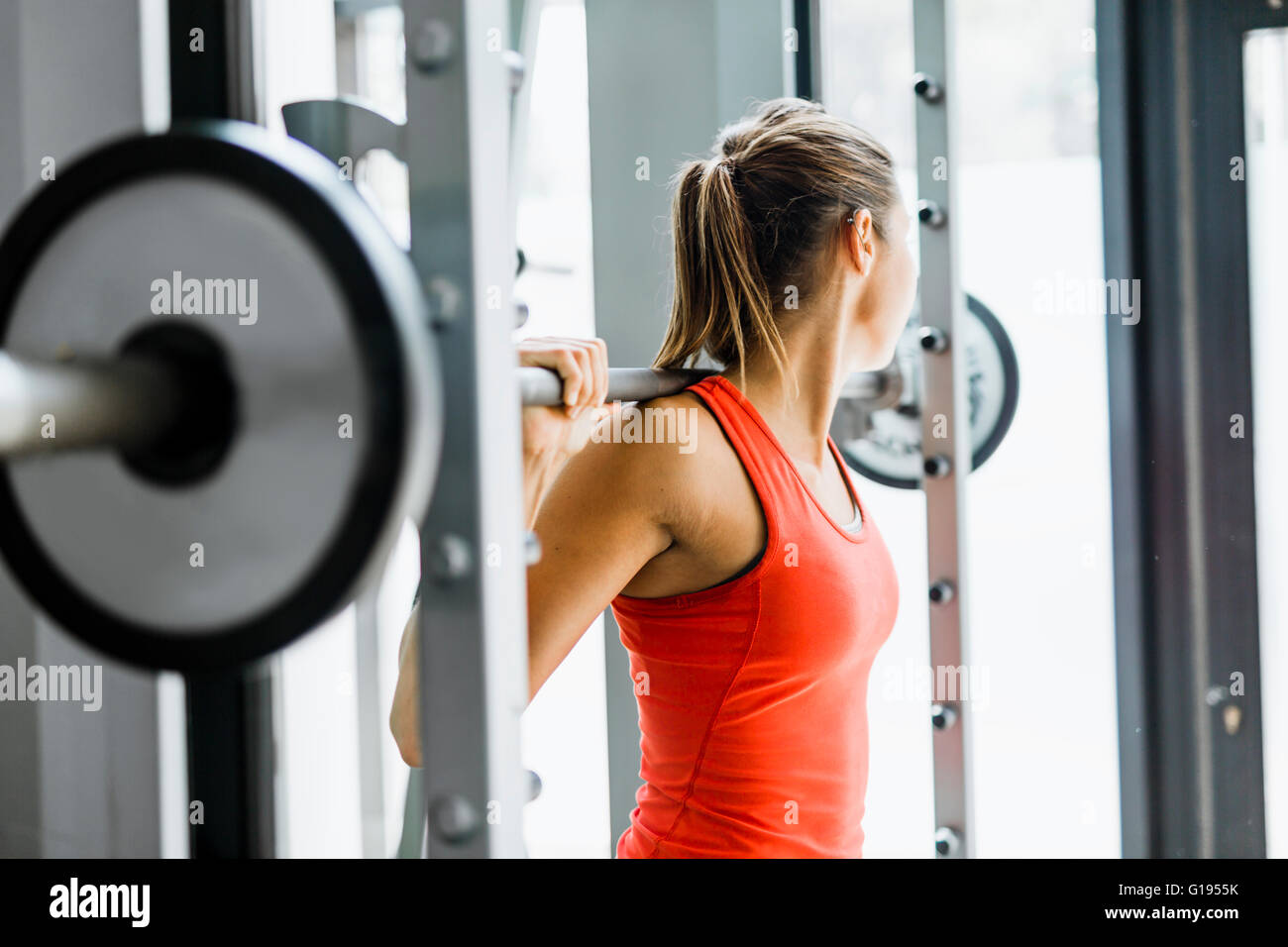 Woman lifting weights hires stock photography and images Alamy
