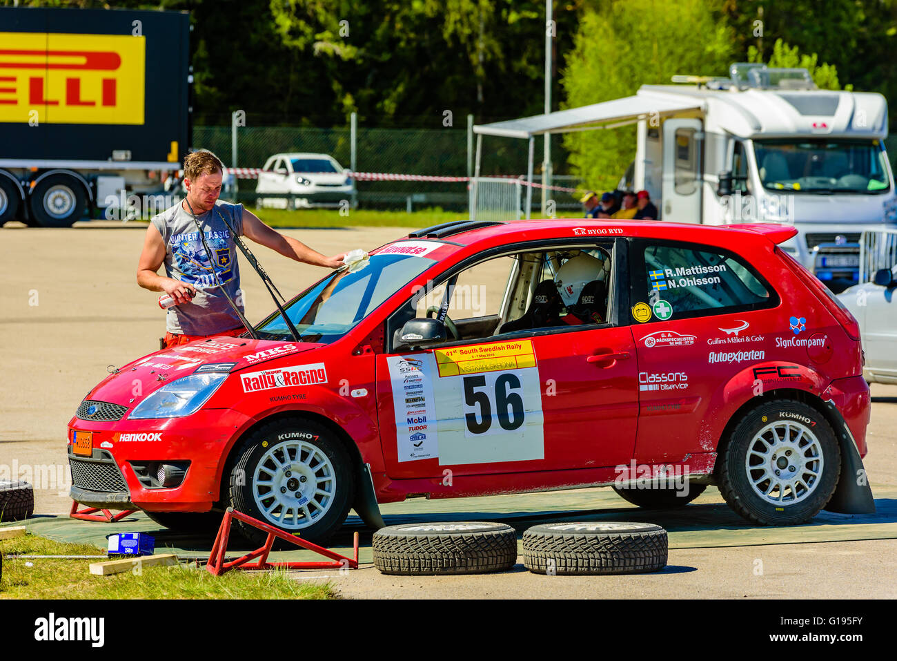 Emmaboda, Sweden - May 7, 2016: 41st South Swedish Rally in service depot.  Crew clean and polish a red Ford Fiesta at team Matti Stock Photo - Alamy