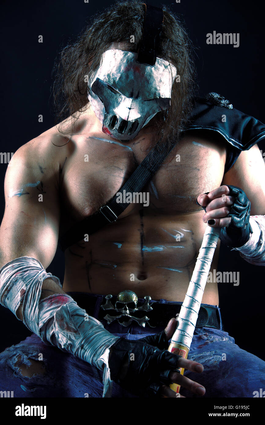 Costumed hero as a street maniac with a bat. Casey Jones on black