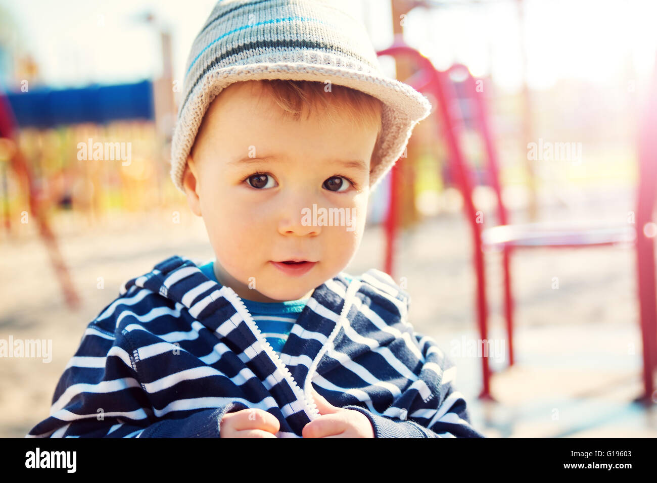 Little Boy Playing On Playground Stock Photo - Alamy