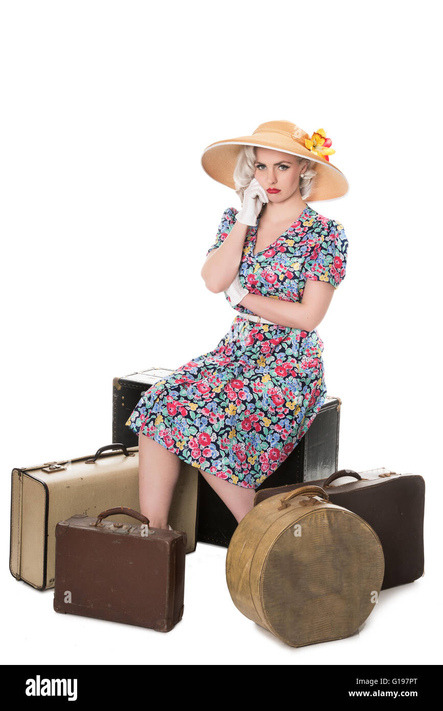 Beautiful retro blond wearing sun hat, isolated on white Stock Photo