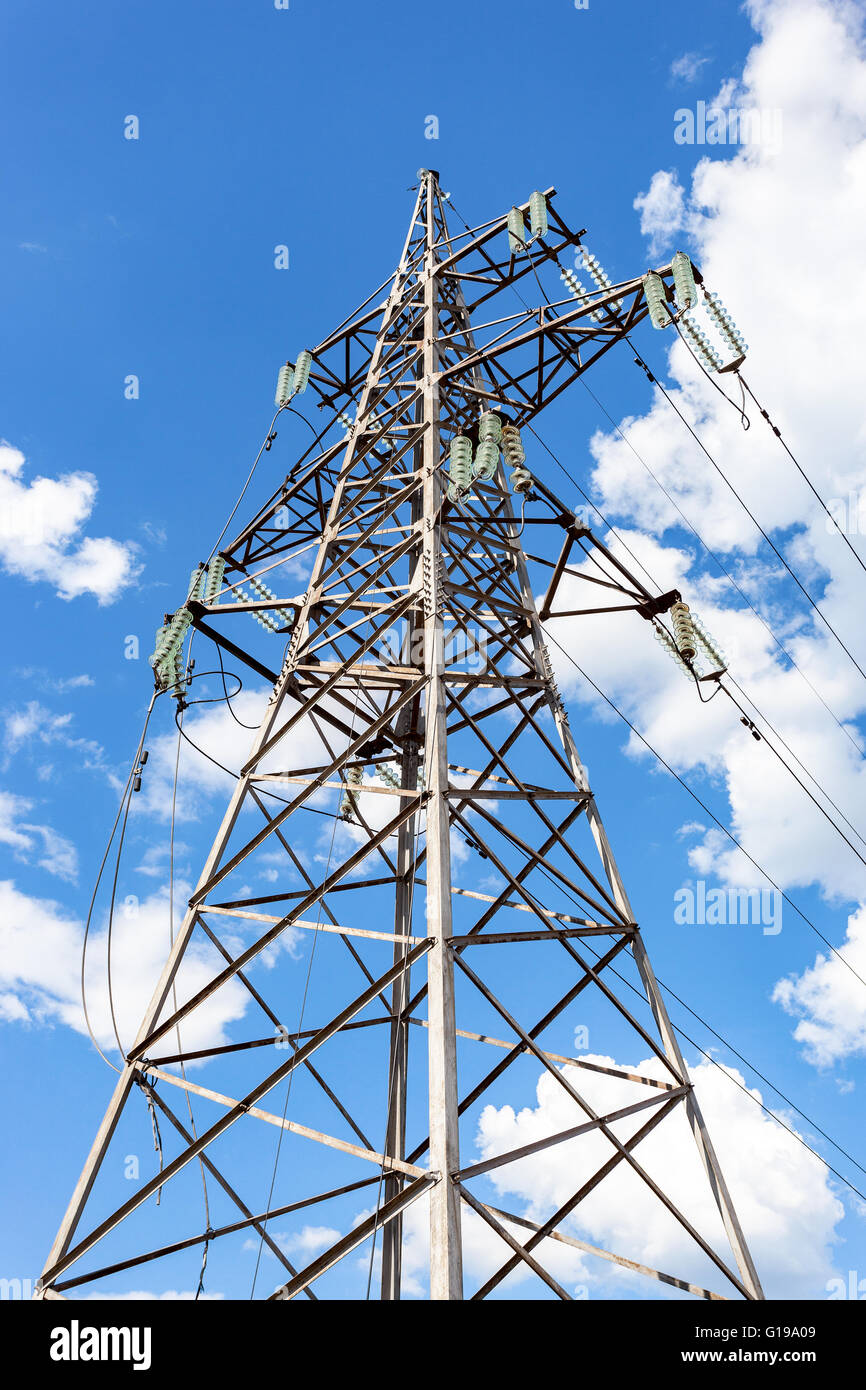 High voltage tower with ragged high-voltage line Stock Photo