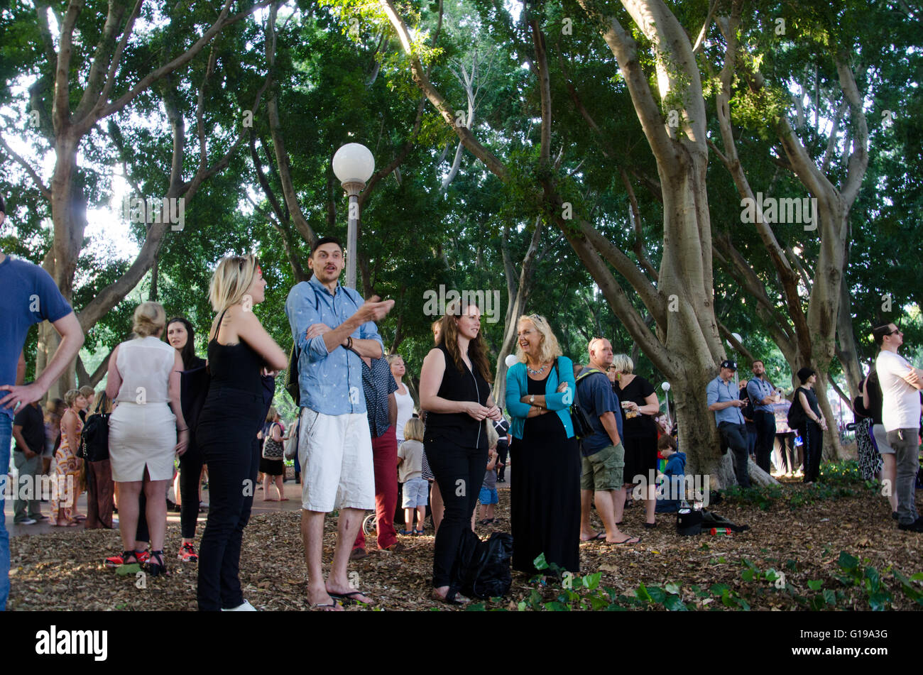 Sydney, Australia - 13th January 2016: The 2016 Sydney Festival hosted a David Bowie tribute event in Sydney's Hyde Park at the Meriton Festival Village. The event attracted large crowds with many people dressing up as David Bowie from his album cover Aladdin Sane. Stock Photo